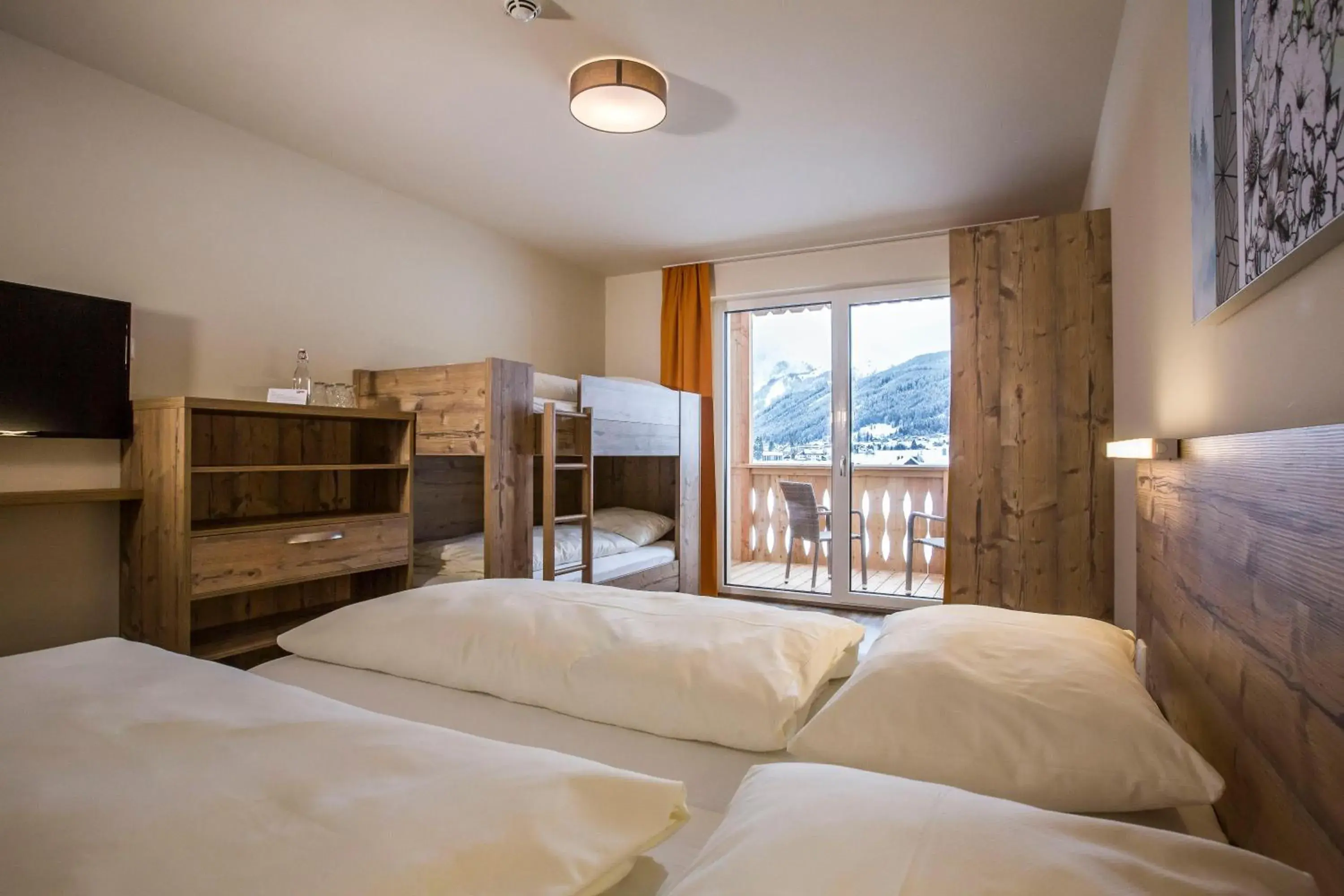 Superior Quadruple Room in COOEE alpin Hotel Dachstein Superior Quadruple Room in COOEE alpin Hotel Dachstein