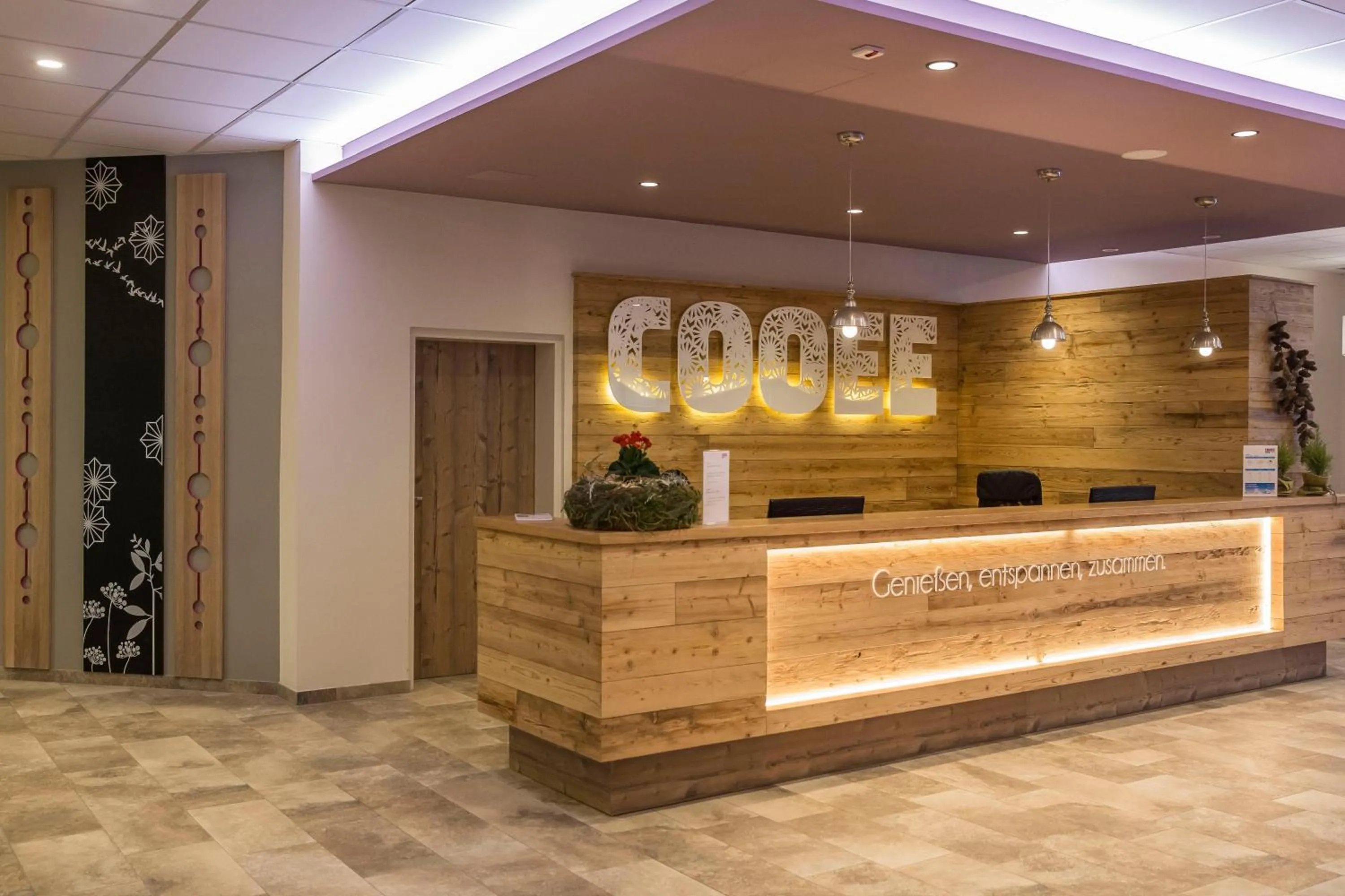 Lobby or reception in COOEE alpin Hotel Dachstein