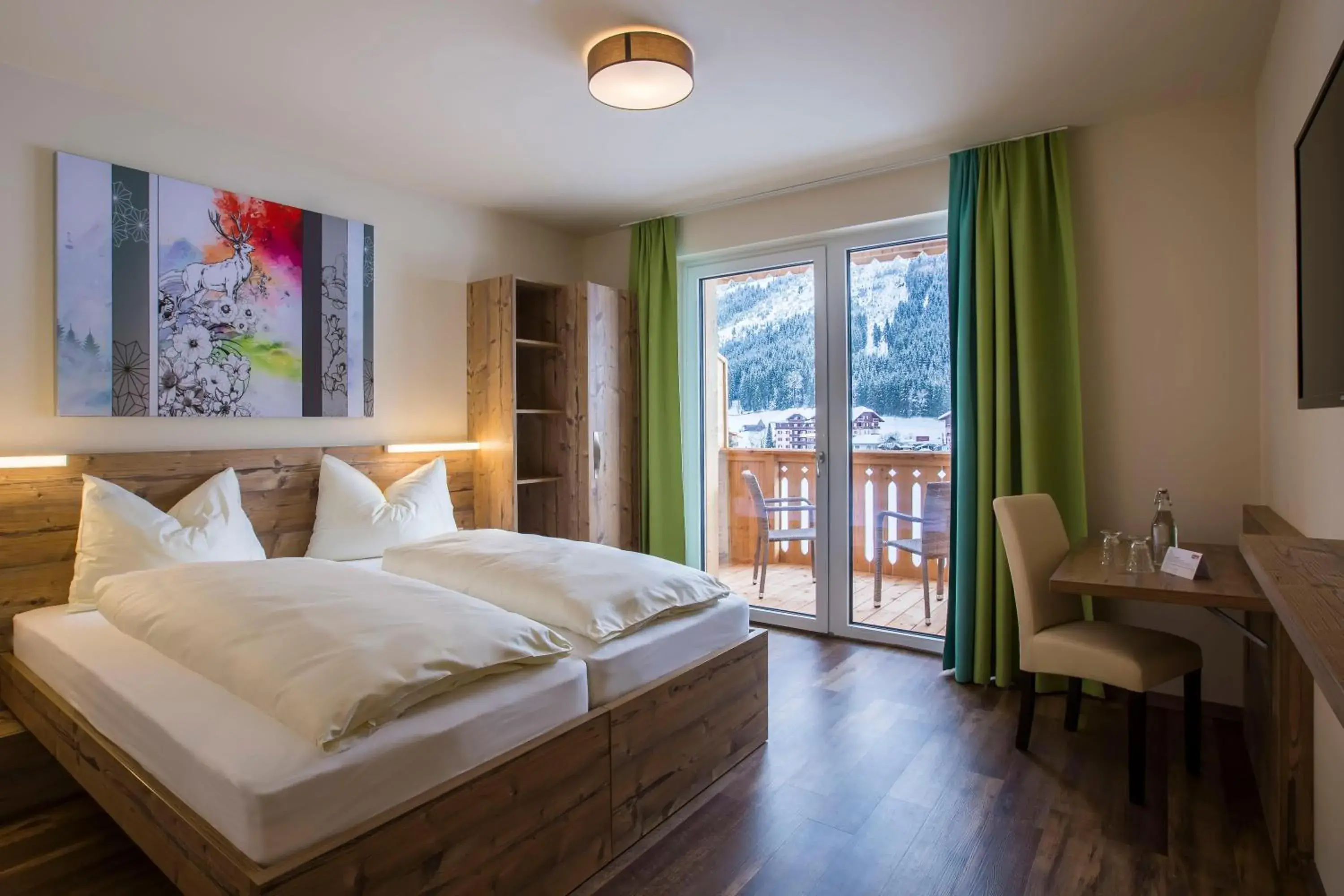 Double or Twin Room with Mountain View in COOEE alpin Hotel Dachstein Double or Twin Room with Mountain View in COOEE alpin Hotel Dachstein
