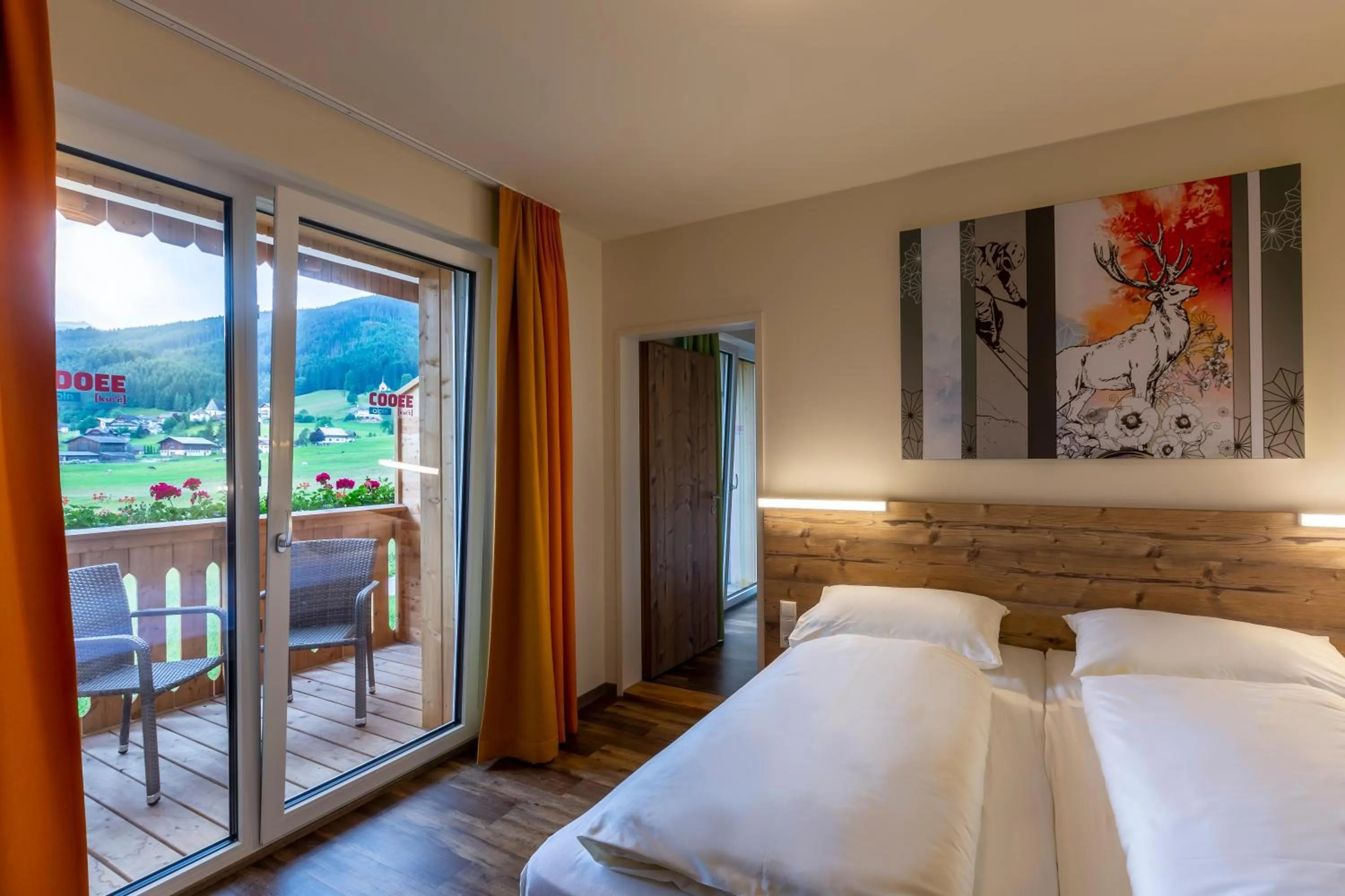 Photo of the whole room, Bed in COOEE alpin Hotel Dachstein