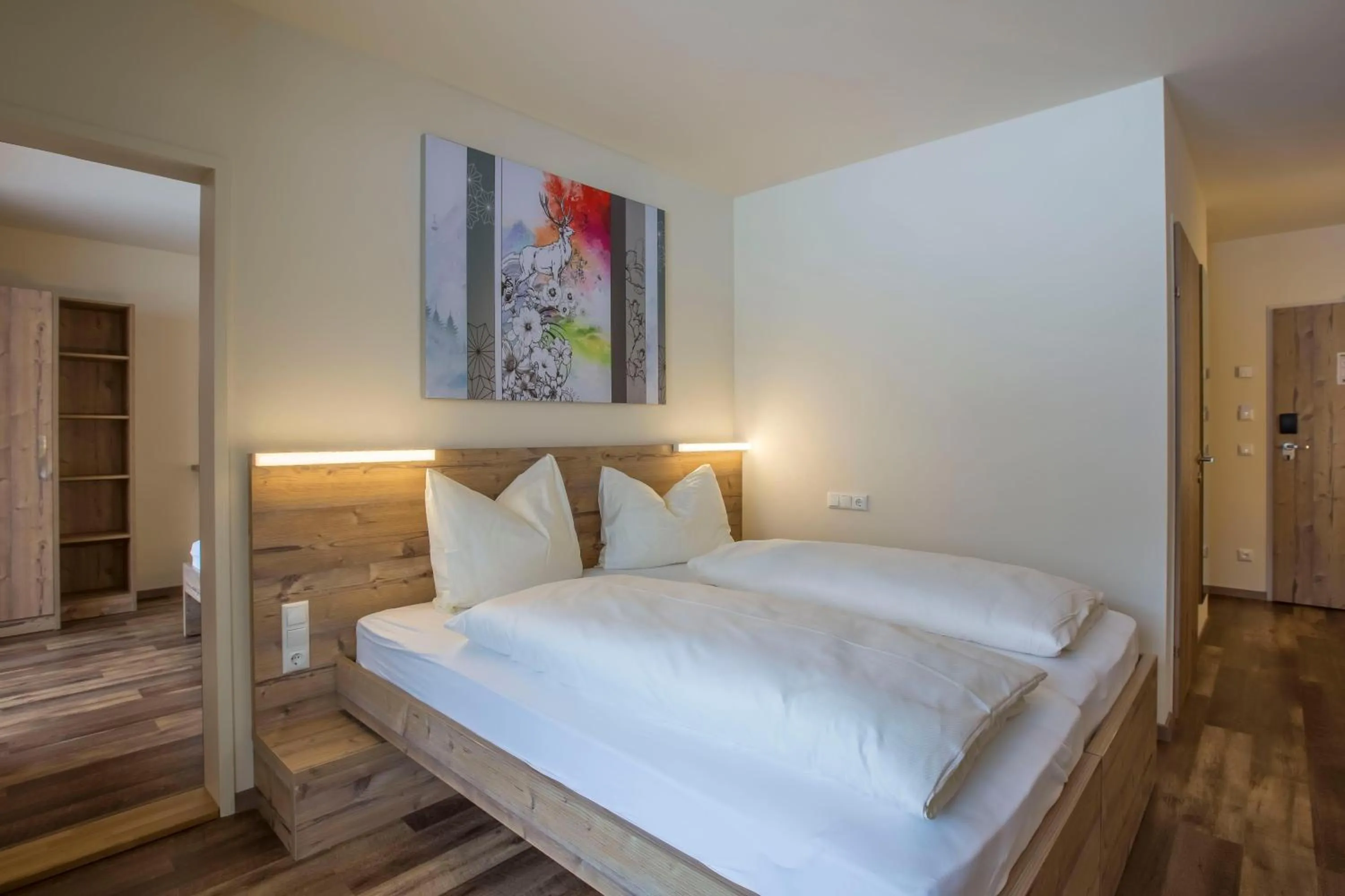 Photo of the whole room, Bed in COOEE alpin Hotel Dachstein