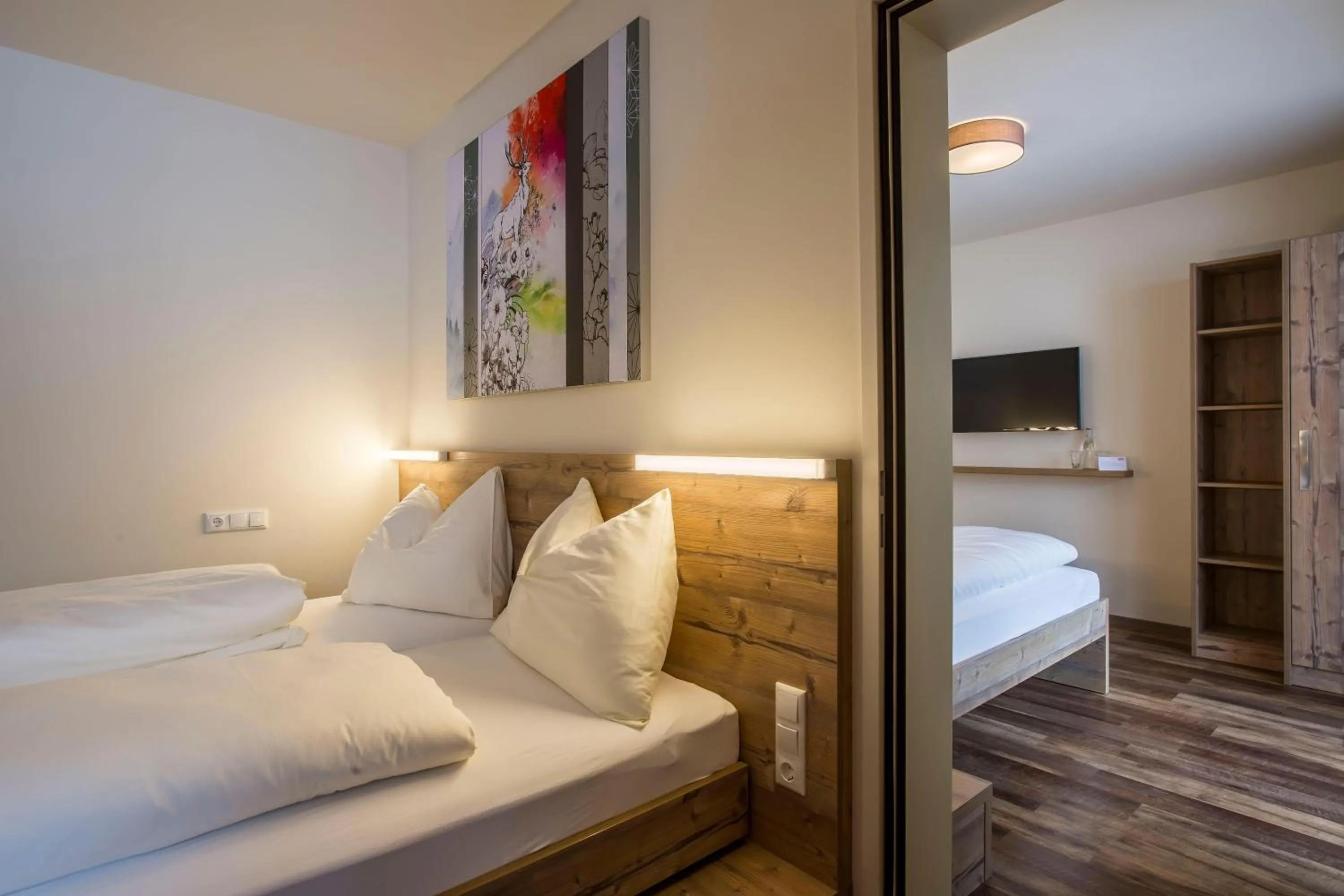 Photo of the whole room, Bed in COOEE alpin Hotel Dachstein