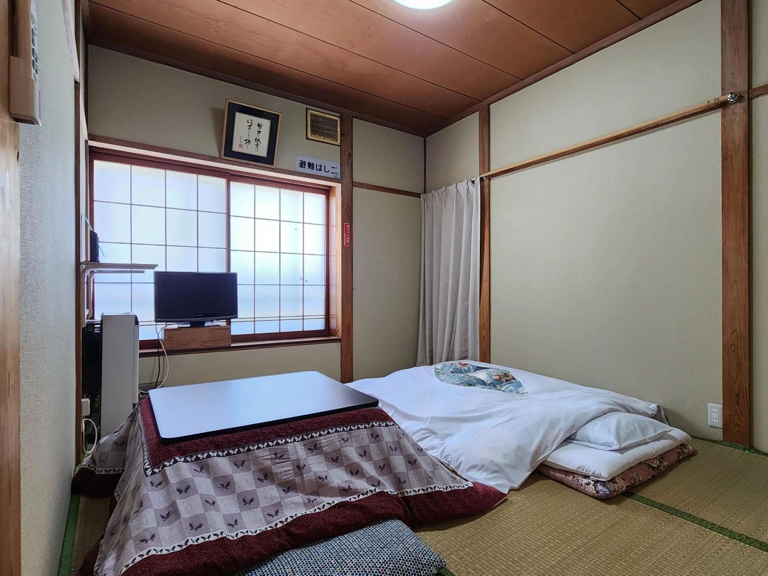 Photo of the whole room, Bed in Minshuku Kojima