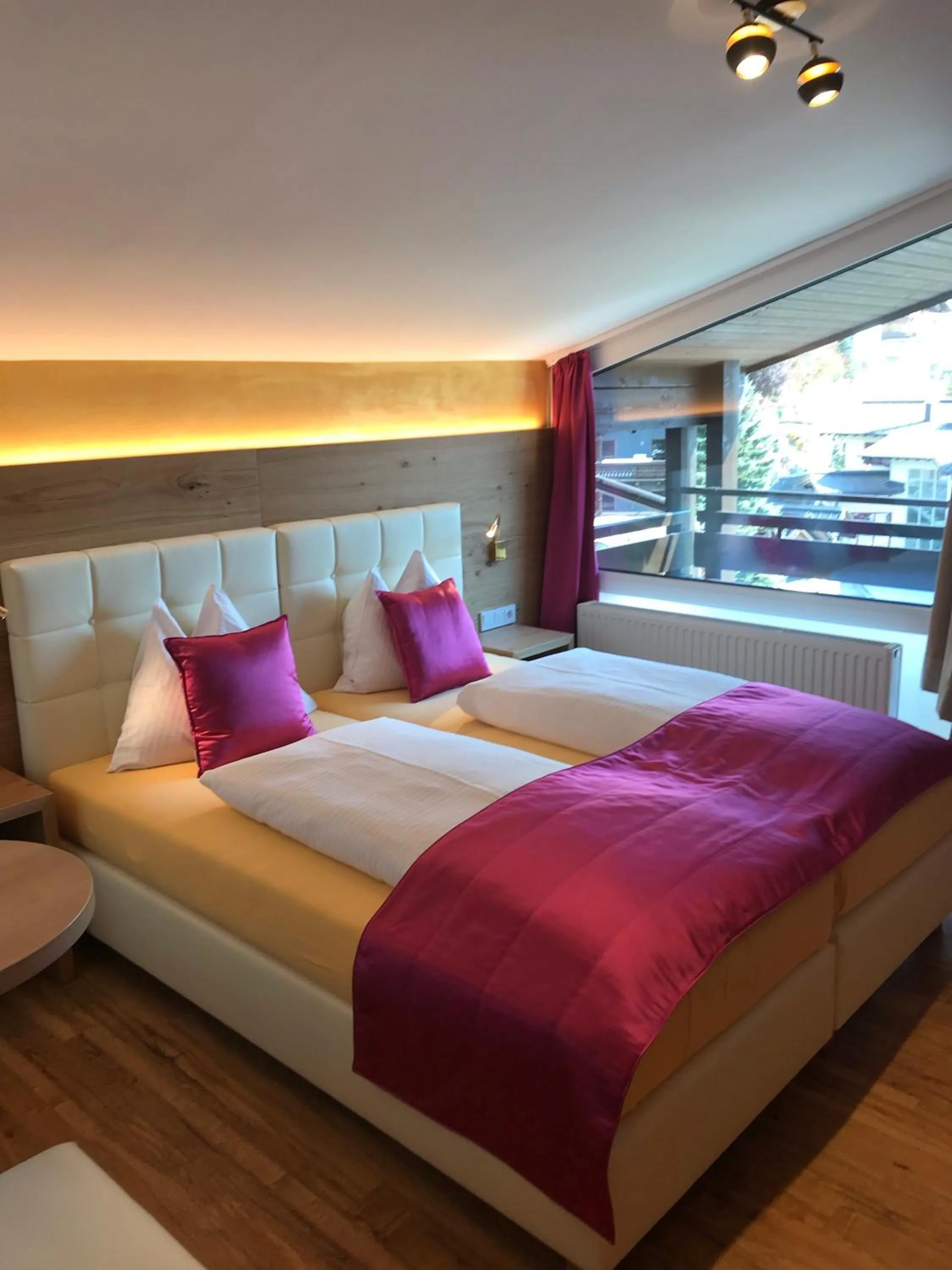 Photo of the whole room, Bed in Berger's Sporthotel