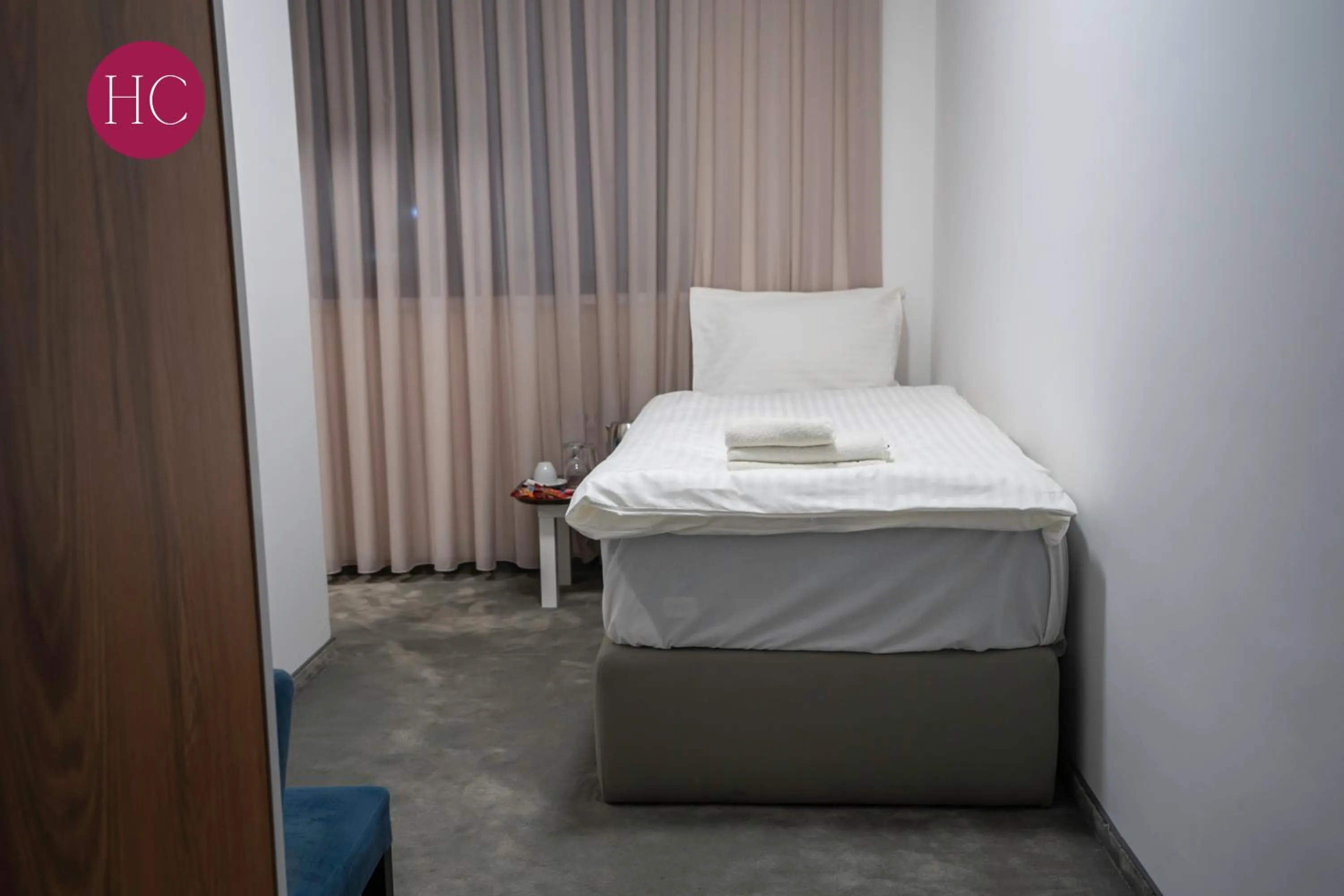 Bed in Central Hotel, Fitness and Spa