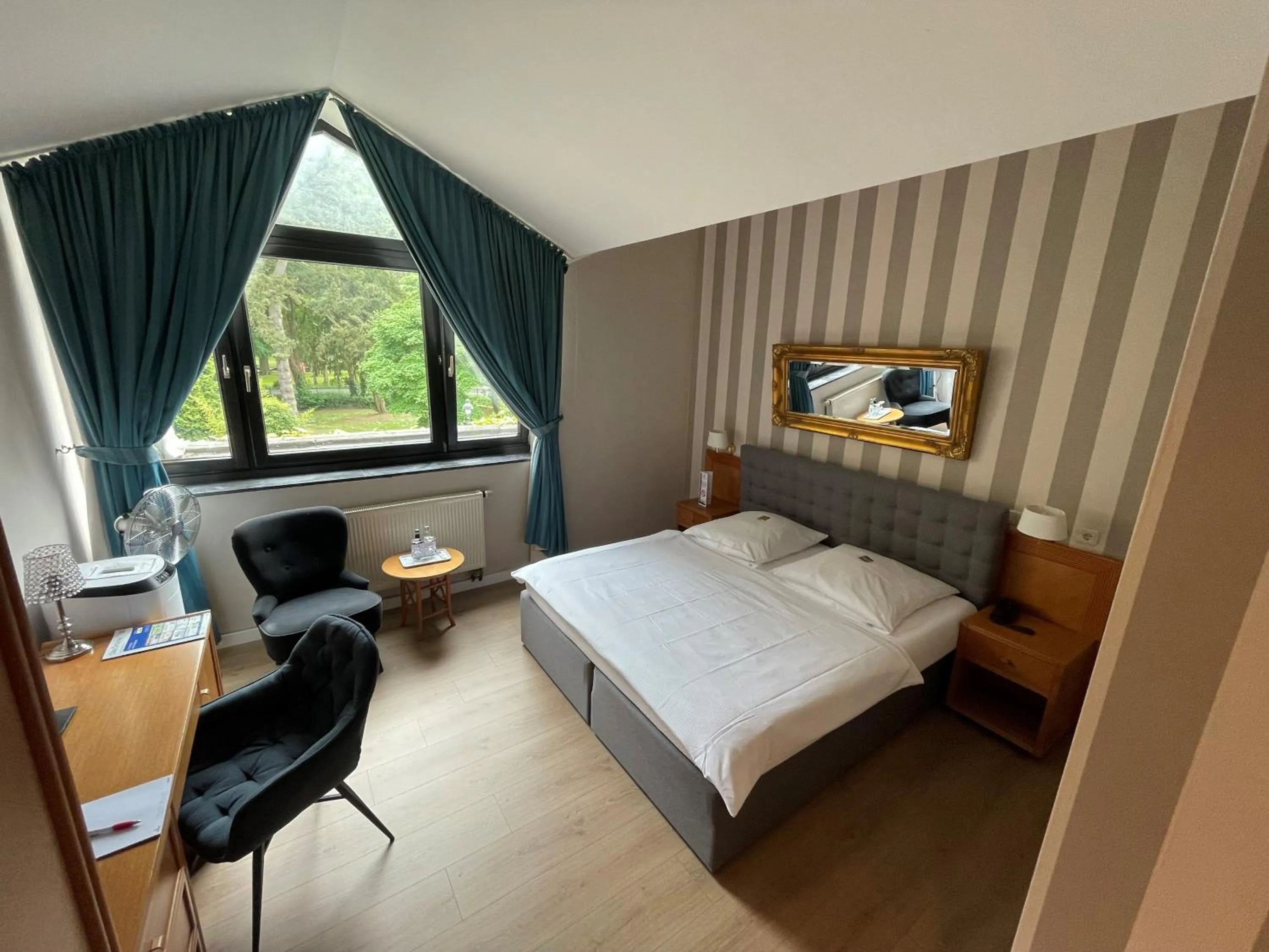 Photo of the whole room, Bed in Burg Wegberg Hotel & Eventlocation