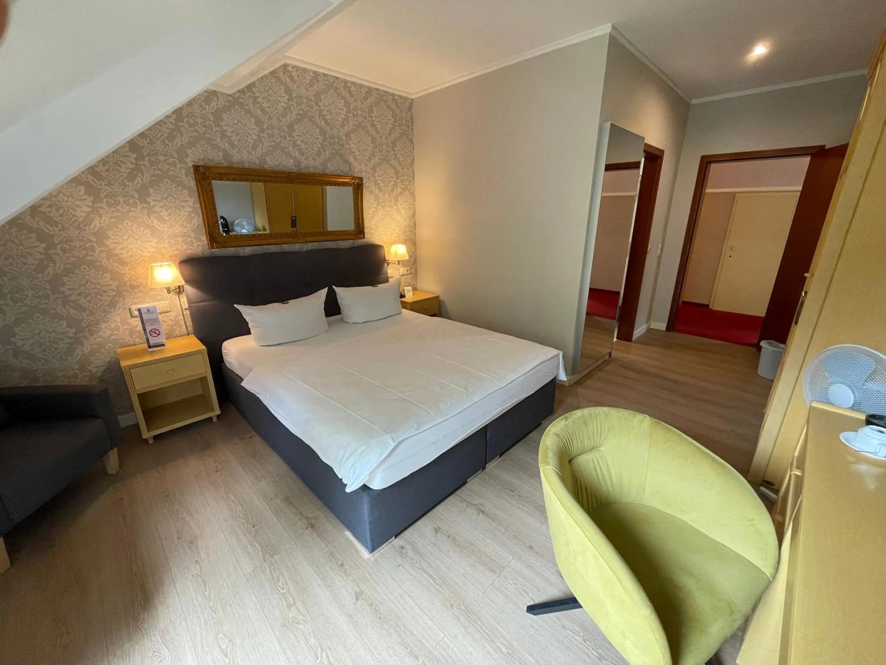 Photo of the whole room, Bed in Burg Wegberg Hotel & Eventlocation