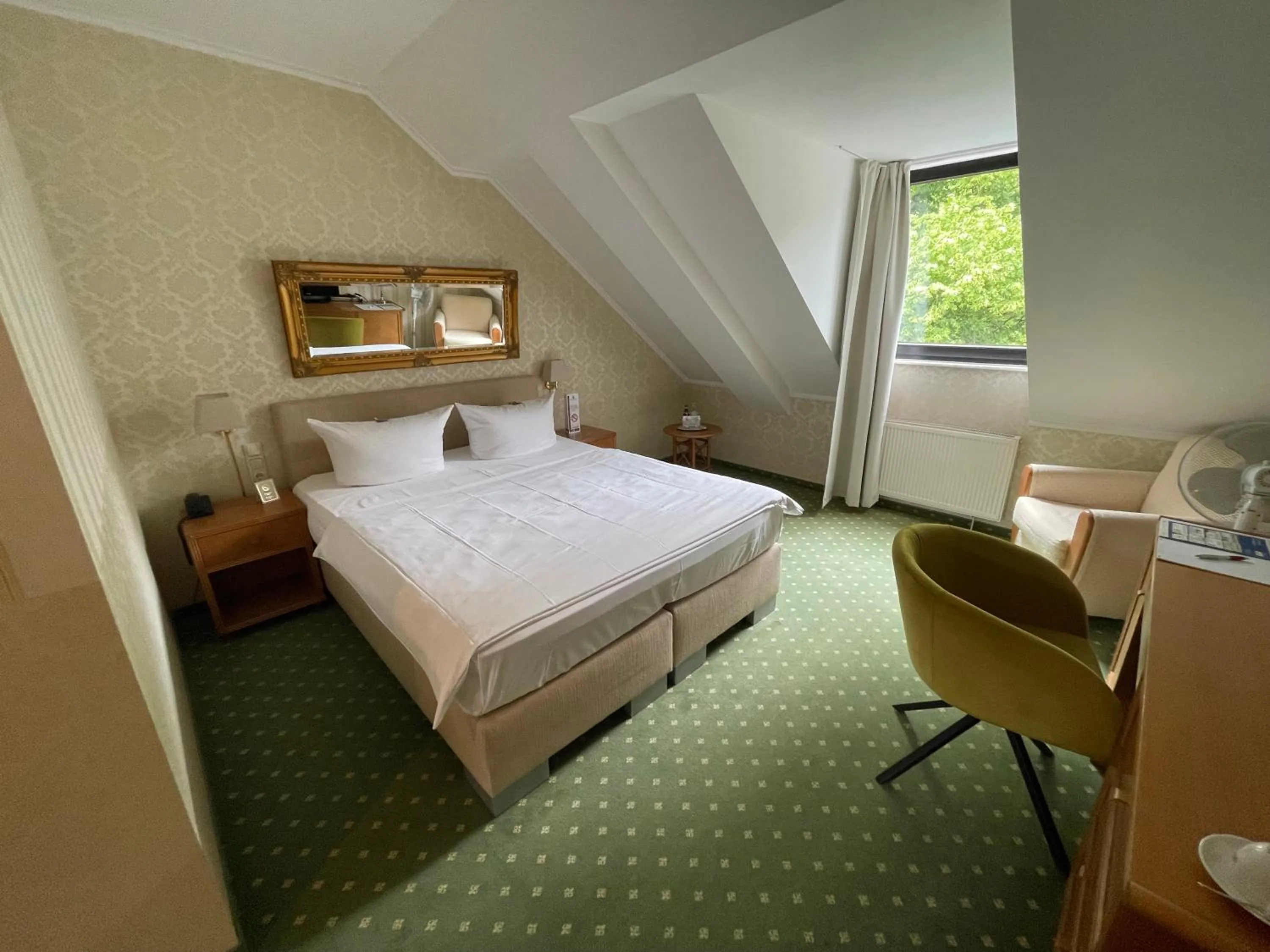 Photo of the whole room, Bed in Burg Wegberg Hotel & Eventlocation