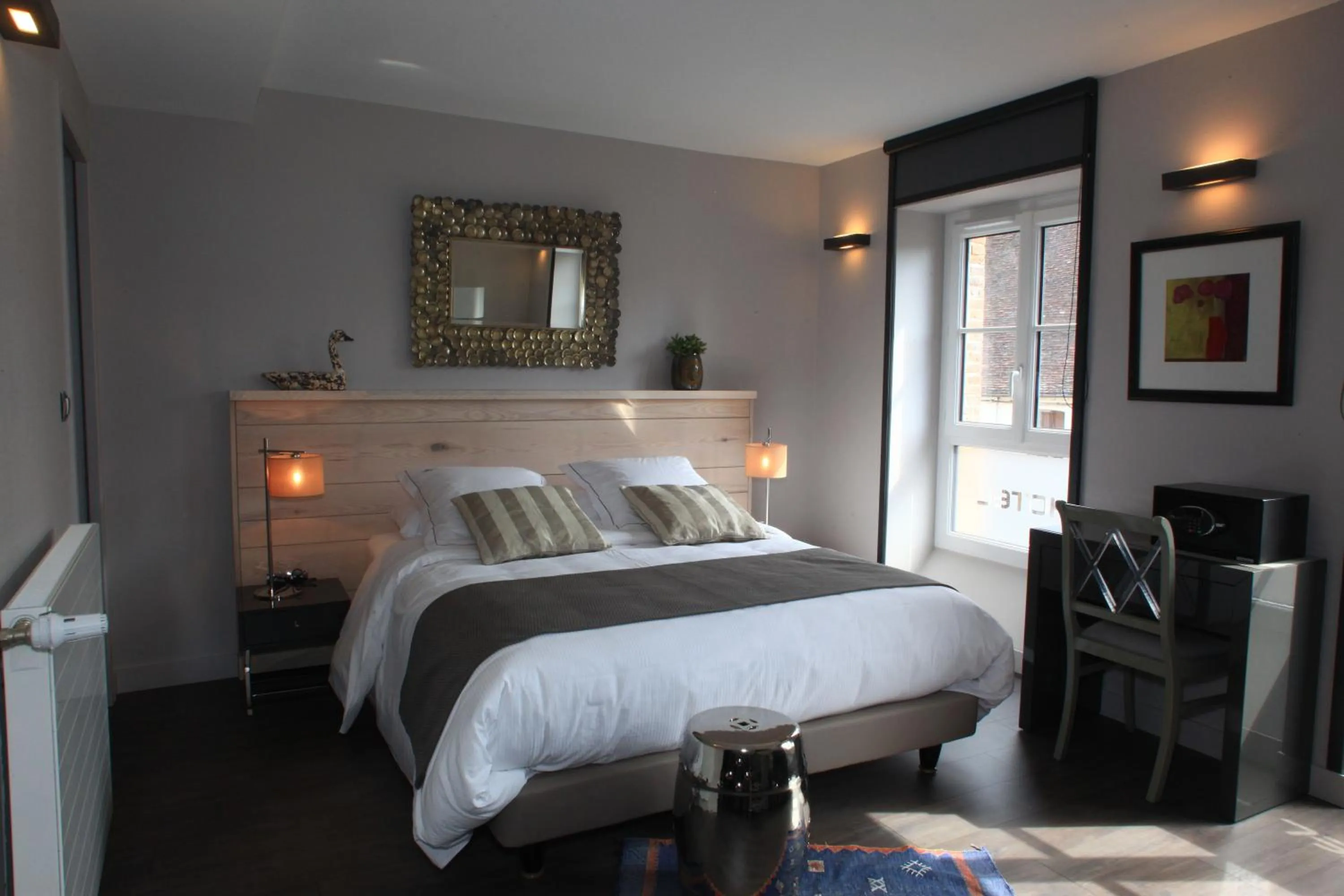 Bed in LOGIS Hotel-Restaurant Le Relais d'Aligre