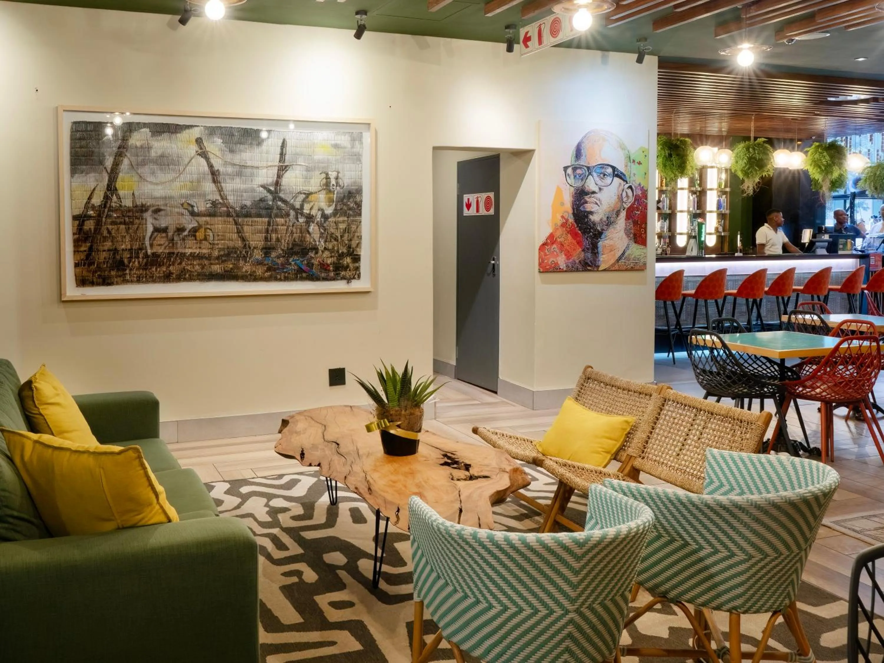 Communal lounge/ TV room in ONOMO Hotel Johannesburg Sandton