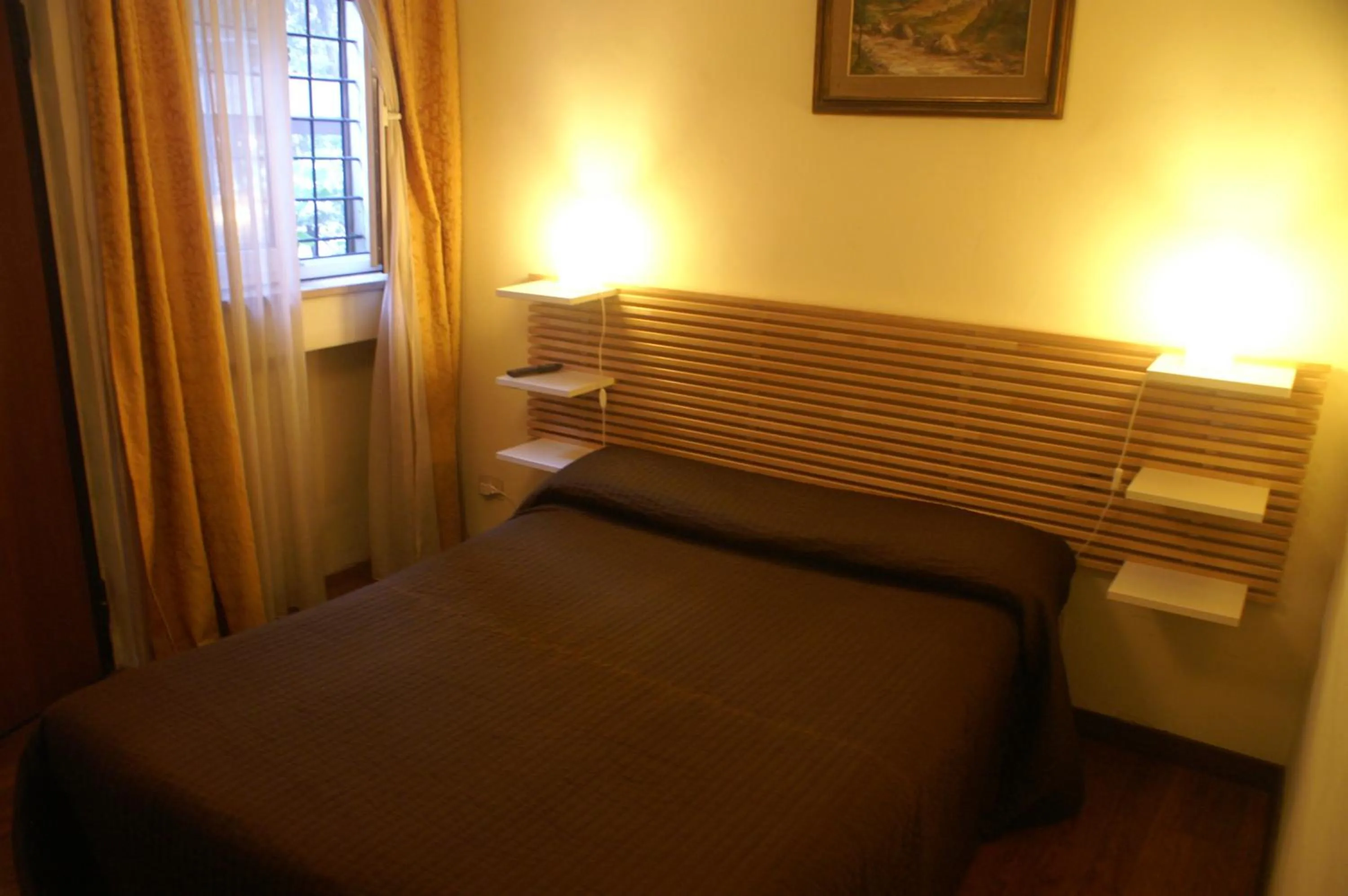 Bed in Affittacamere Villa Wilson