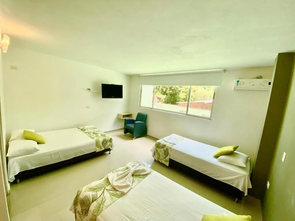 Bed in Biohotel Rio Claro