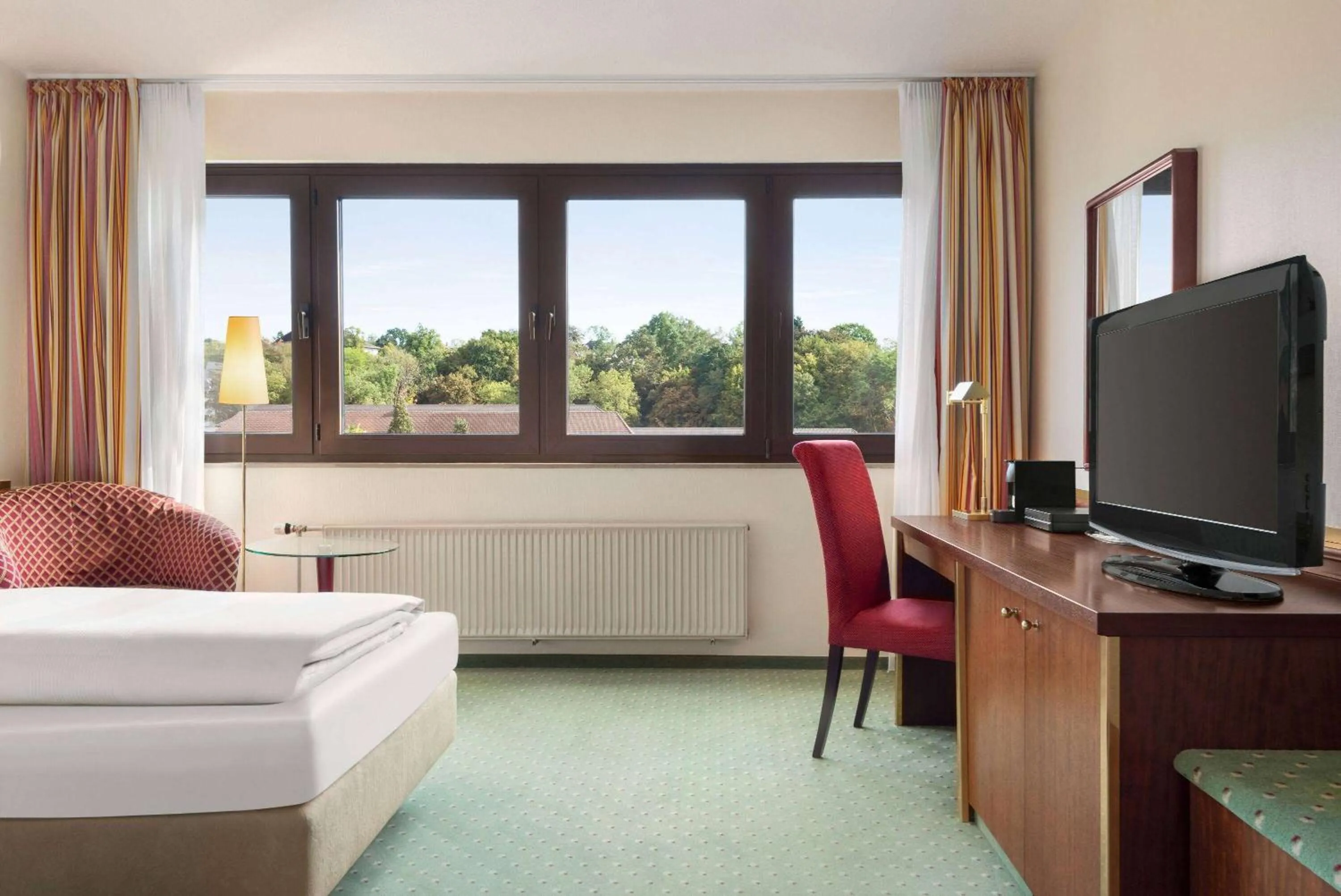 Photo of the whole room, Bed in Amedia Hotel Siegen City, Trademark Collection by Wyndham