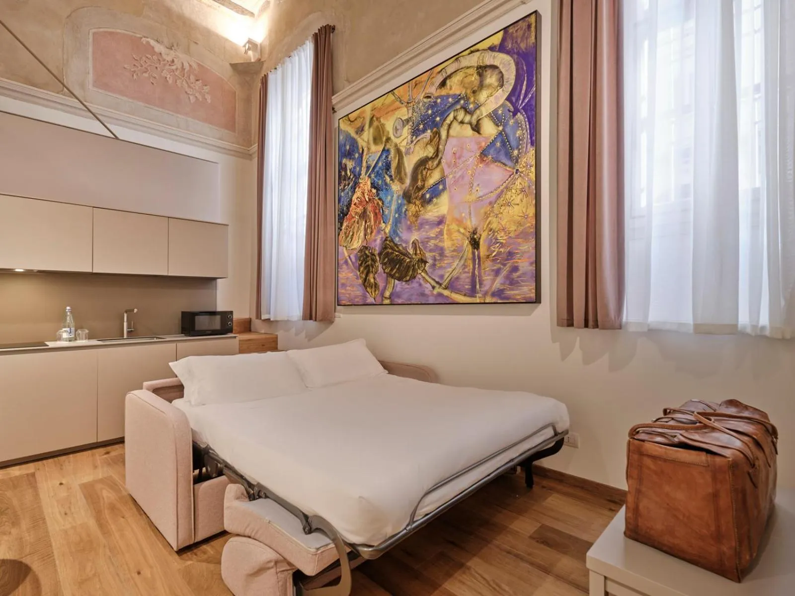 Bed in Palazzo Del Carretto-Art Apartments and Guesthouse