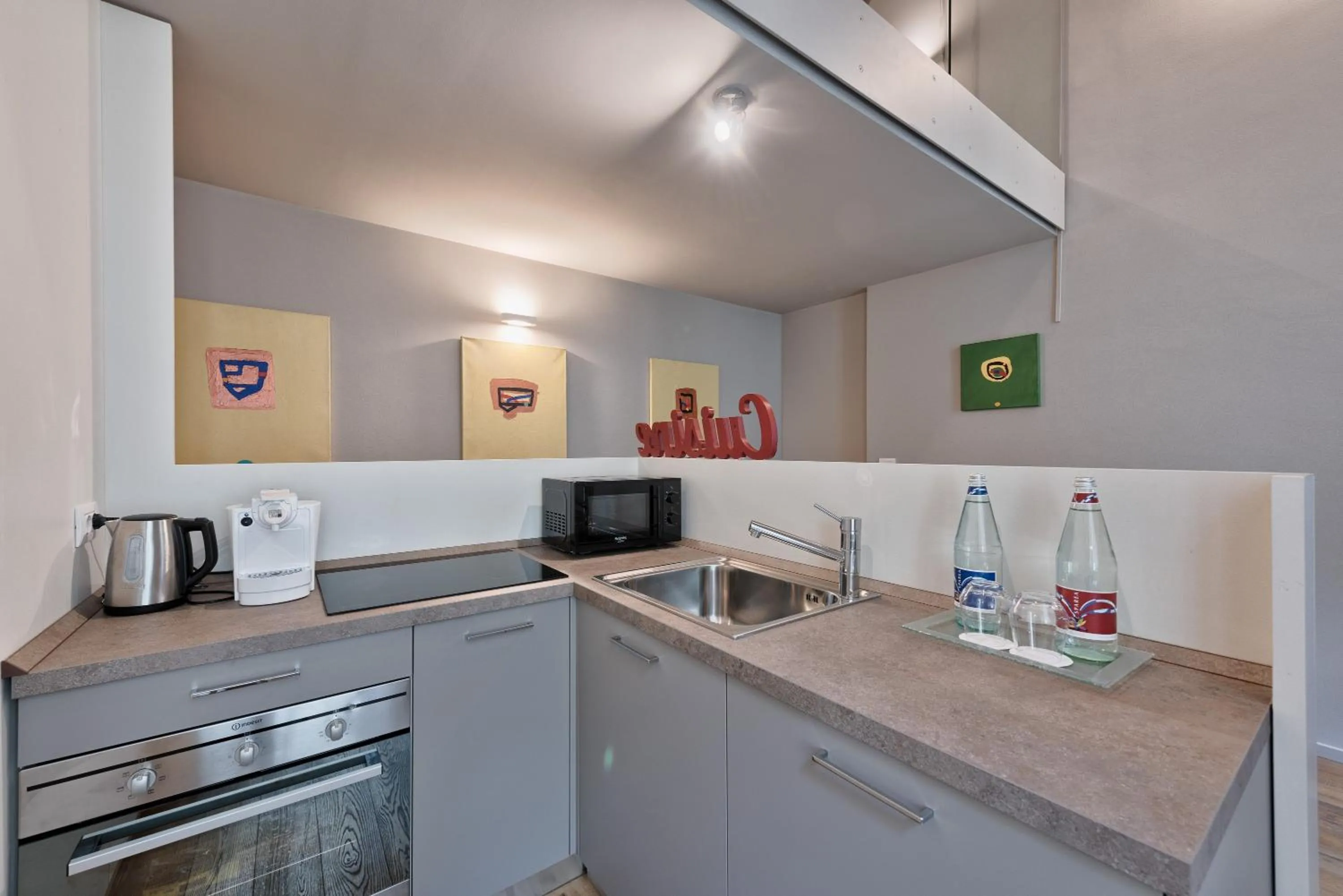 Kitchen or kitchenette in Palazzo Del Carretto-Art Apartments and Guesthouse