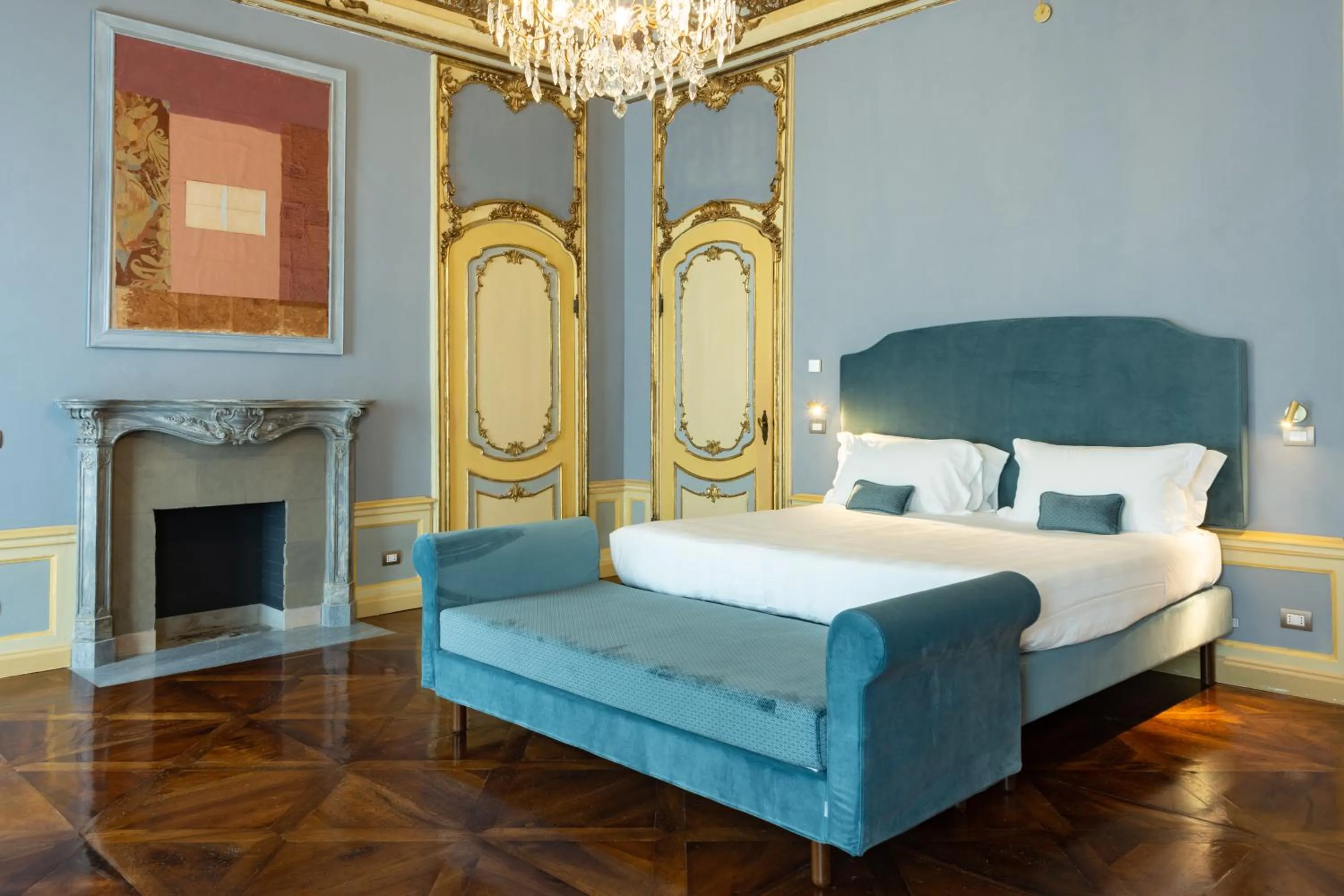 Bed in Palazzo Del Carretto-Art Apartments and Guesthouse