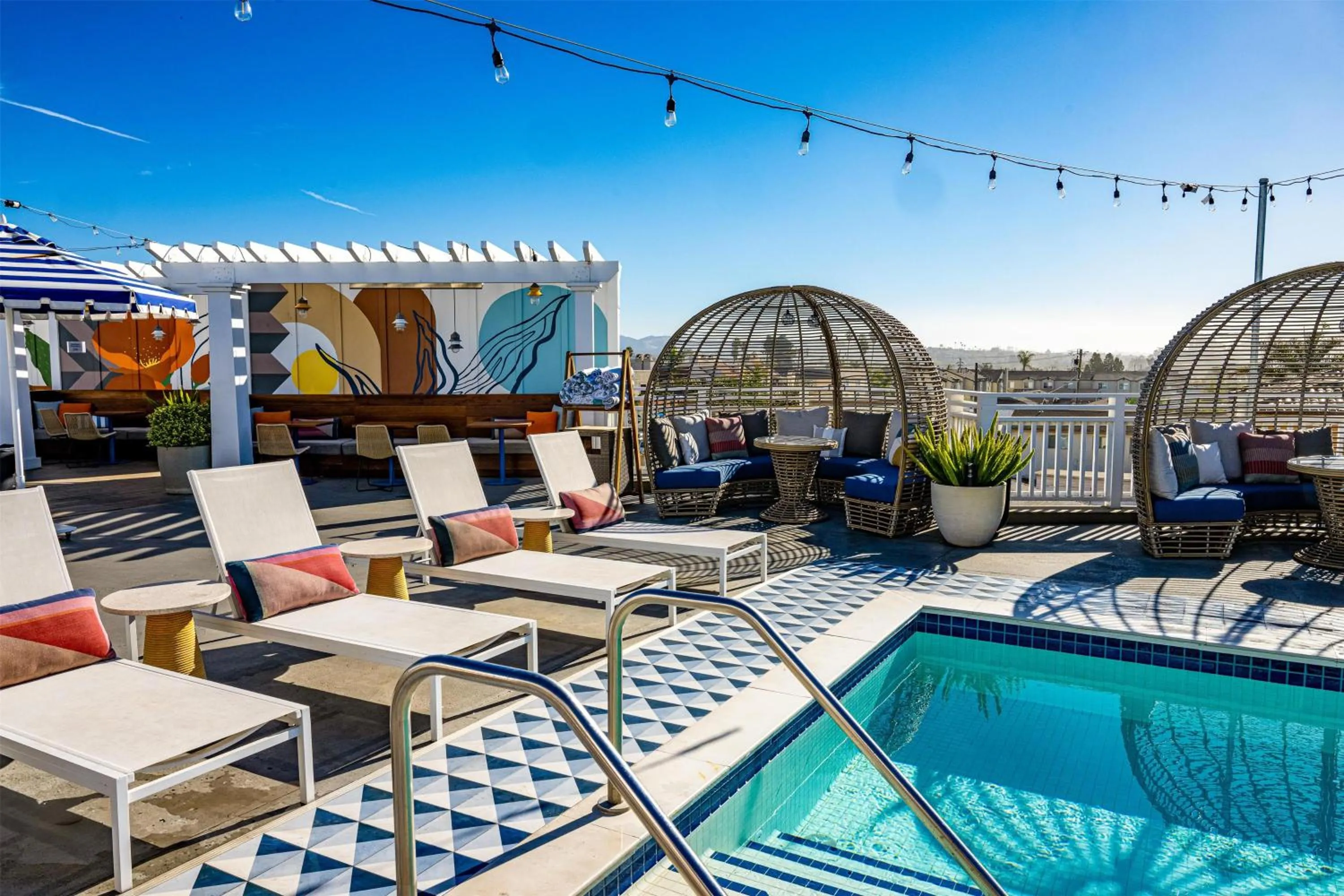 Pool view in Inn at the Pier Pismo Beach, Curio Collection by Hilton