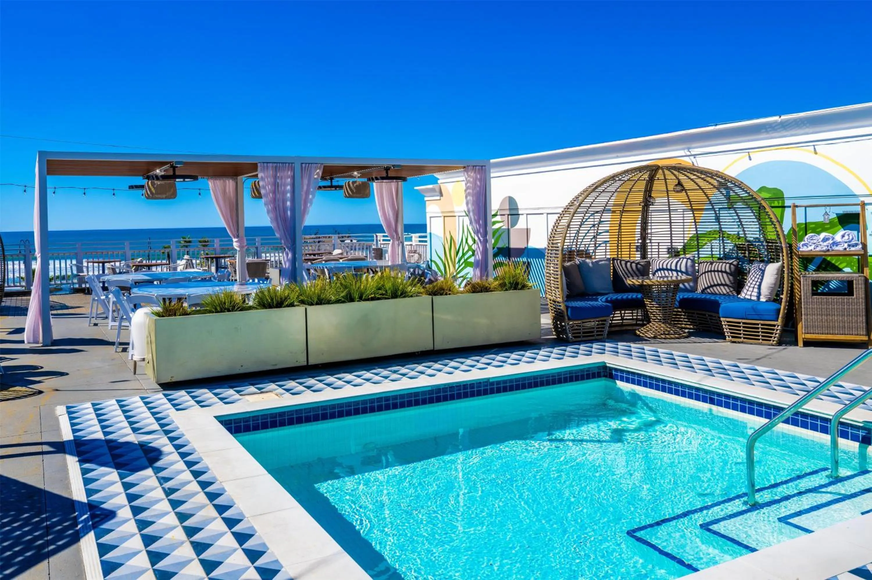 Pool view in Inn at the Pier Pismo Beach, Curio Collection by Hilton