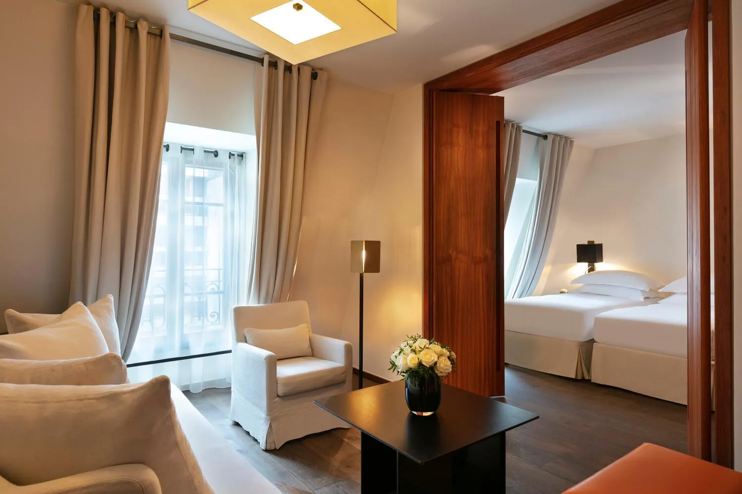 Living room, Bed in Le Metropolitan, Paris Tour Eiffel, a Tribute Portfolio Hotel