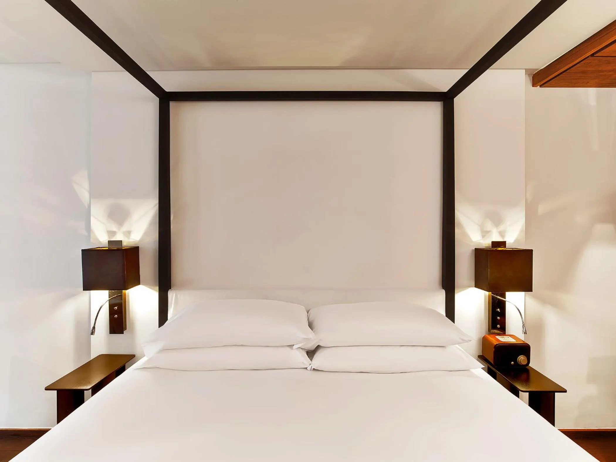 Bed in Le Metropolitan, Paris Tour Eiffel, a Tribute Portfolio Hotel