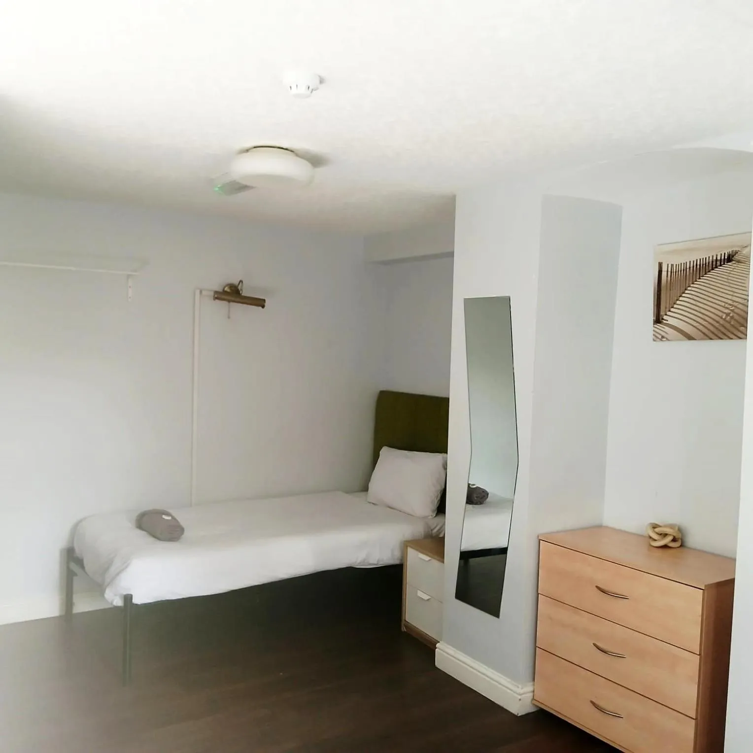 Bed in Queens Guesthouse Manchester