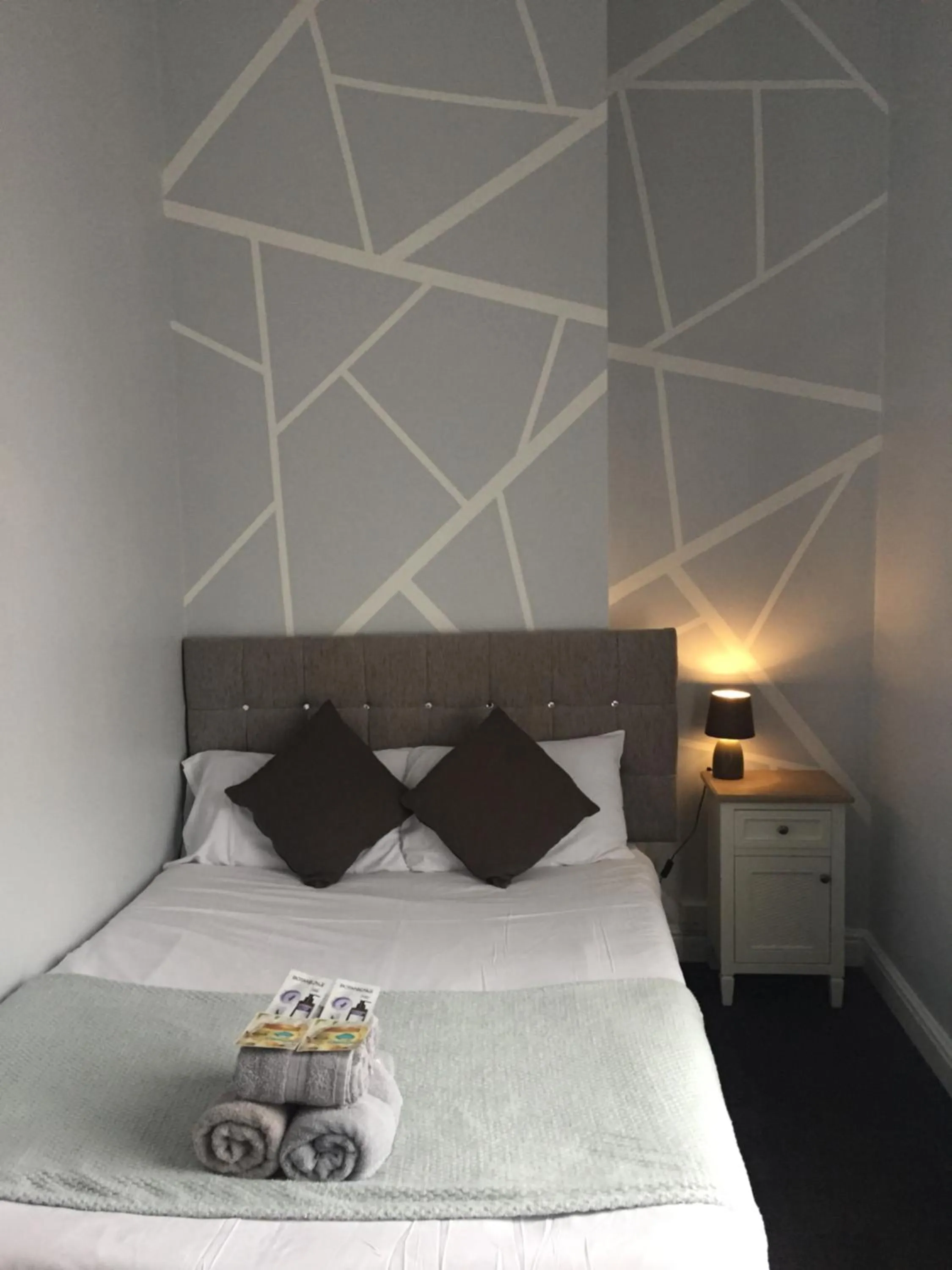 Decorative detail, Bed in Queens Guesthouse Manchester