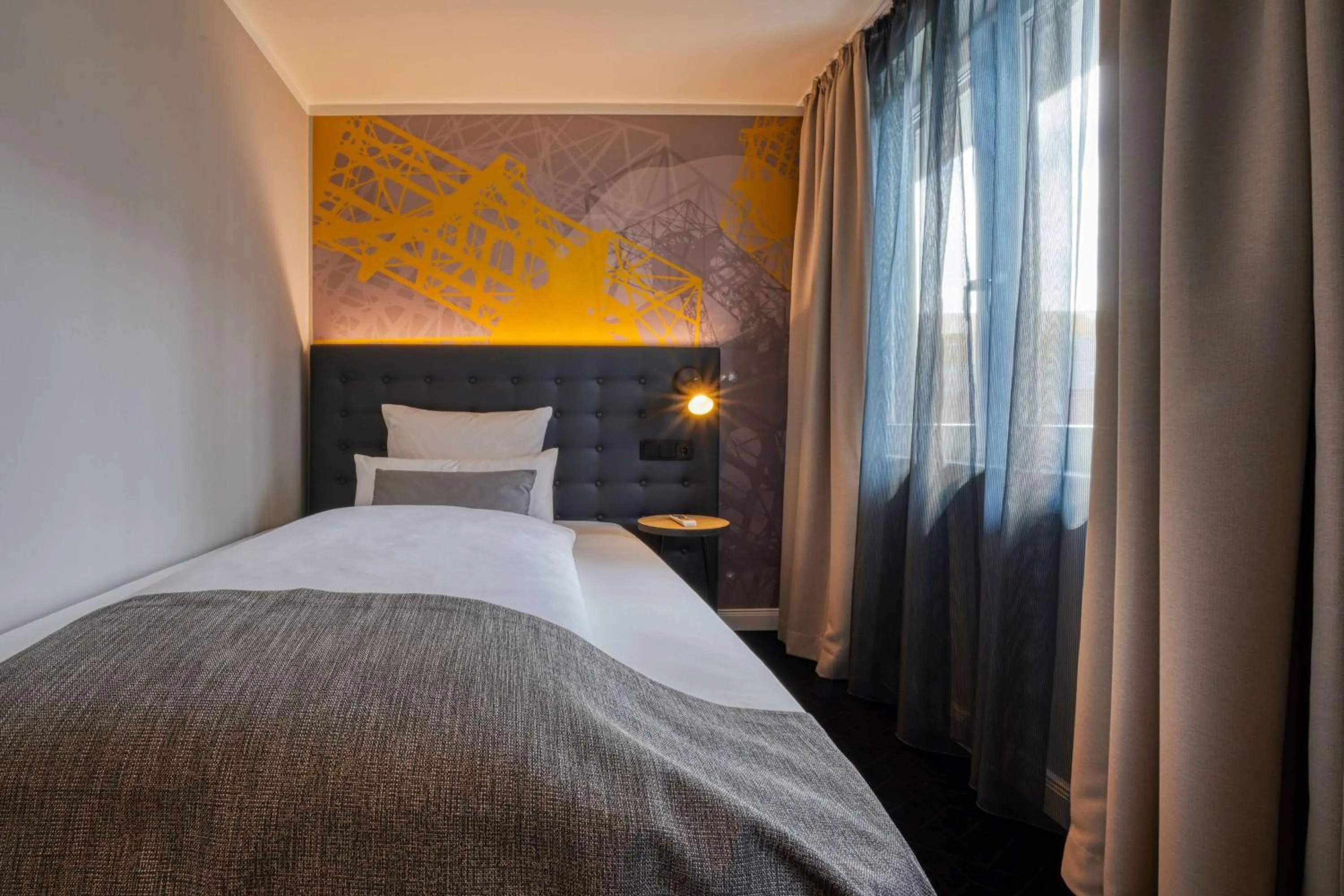 Photo of the whole room, Bed in Vienna House Easy by Wyndham Dortmund City