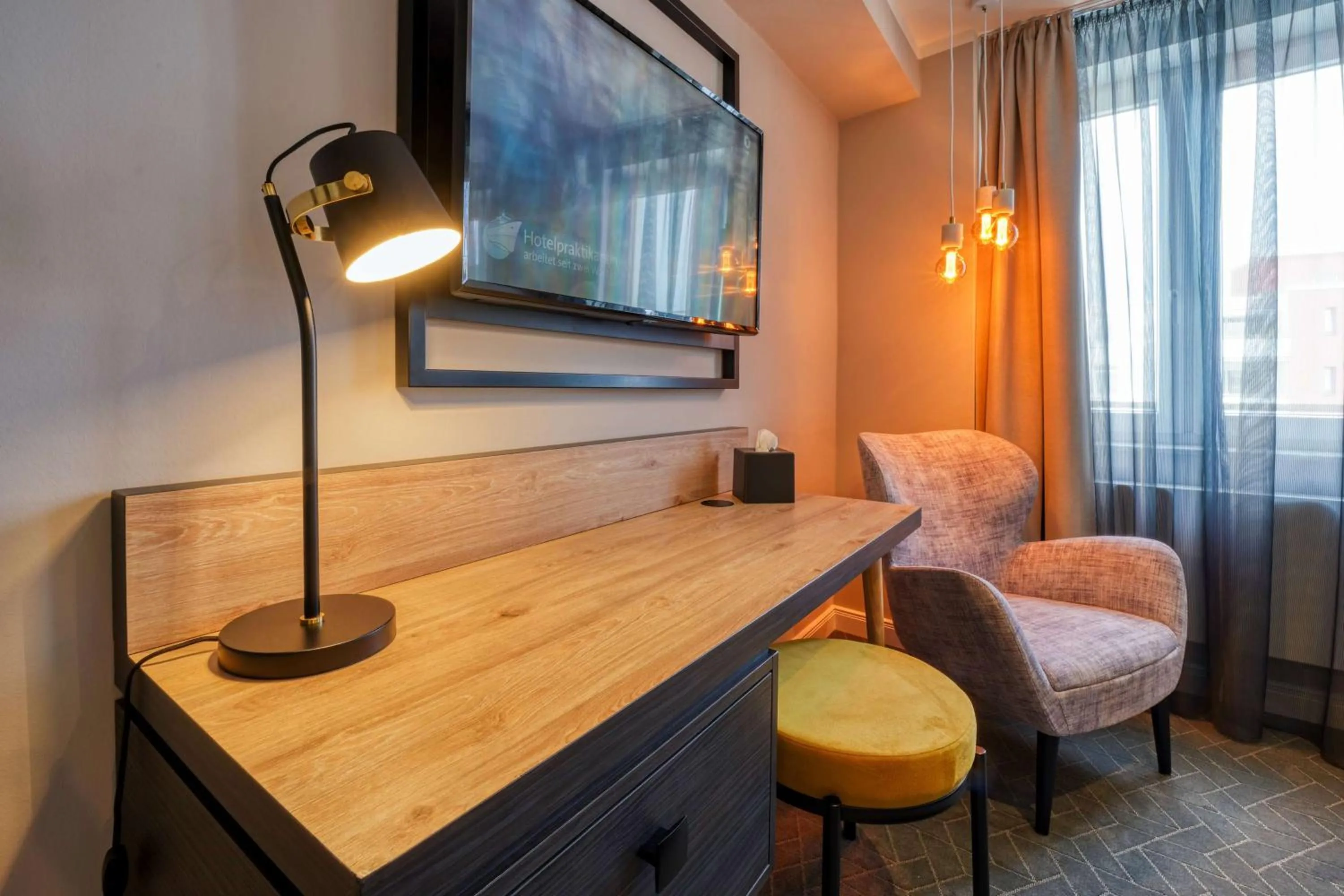 Photo of the whole room in Vienna House Easy by Wyndham Dortmund City