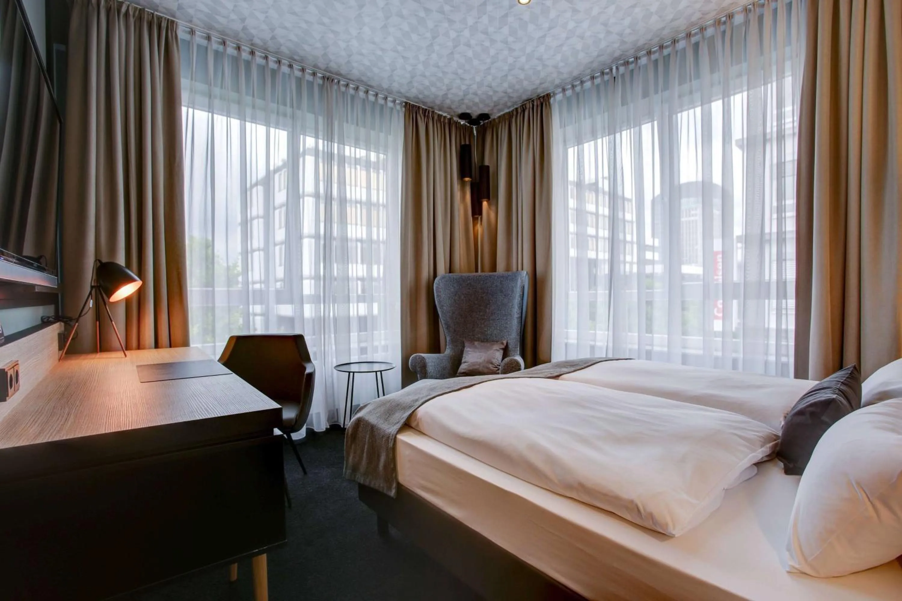 Photo of the whole room, Bed in Vienna House Easy by Wyndham Dortmund City