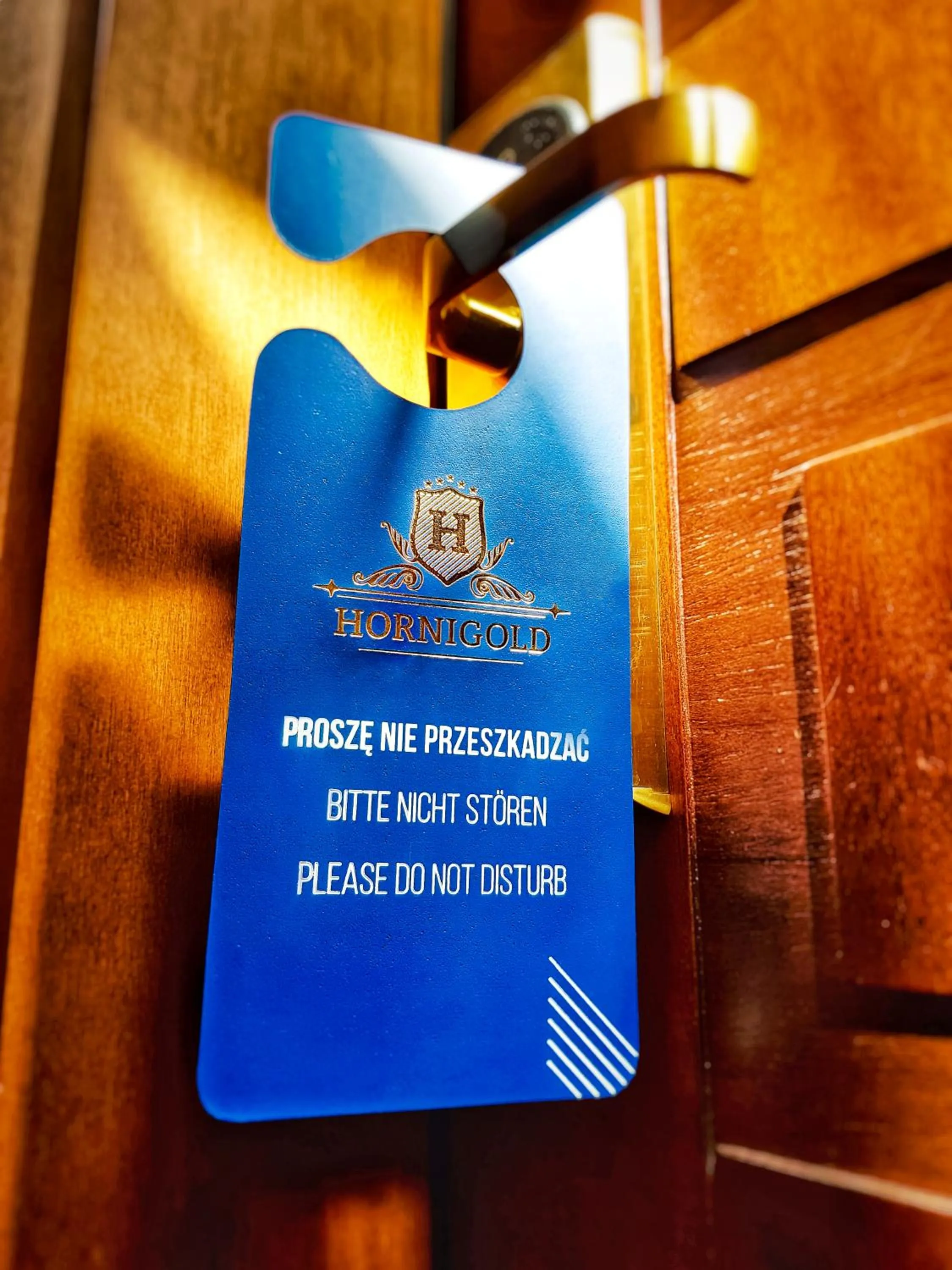 Property logo or sign in Aparthotel Hornigold "W Zielonej Kamienicy"