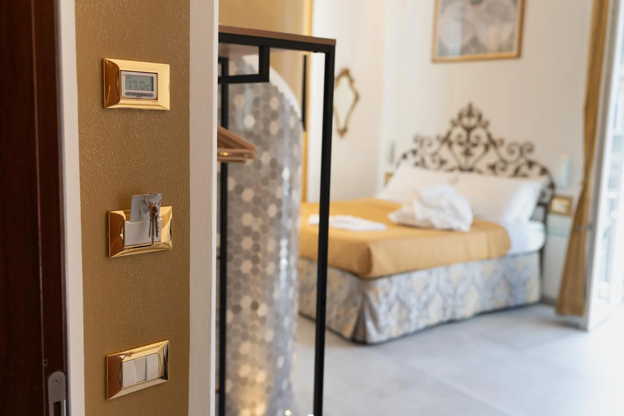 Bed in Teresa Rooms & Suites