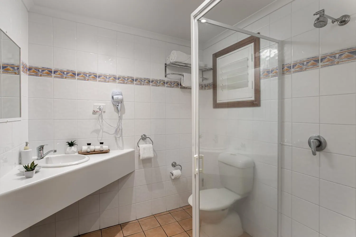 Bathroom in Sunlit Waters Studio Apartments
