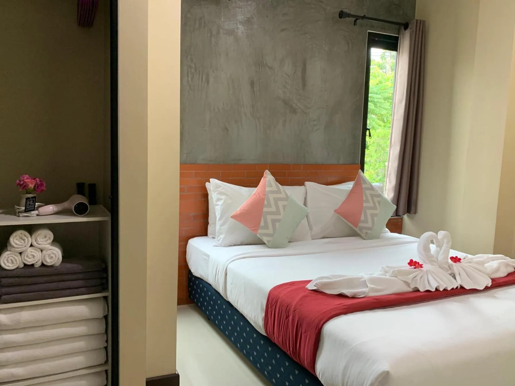 Bed in Isayarada Apartment