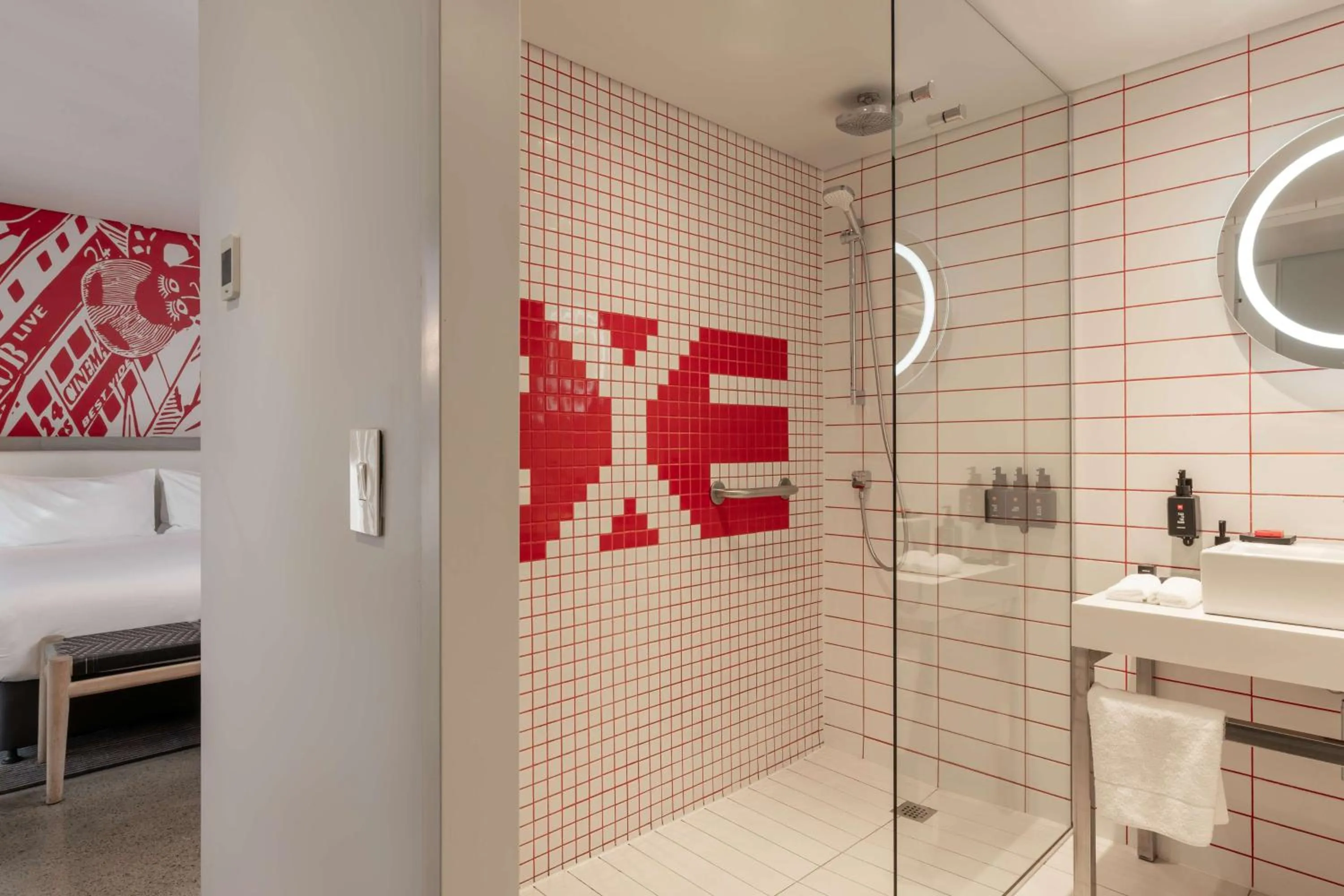 Bathroom, Bed in Radisson RED Hotel V&A Waterfront Cape Town