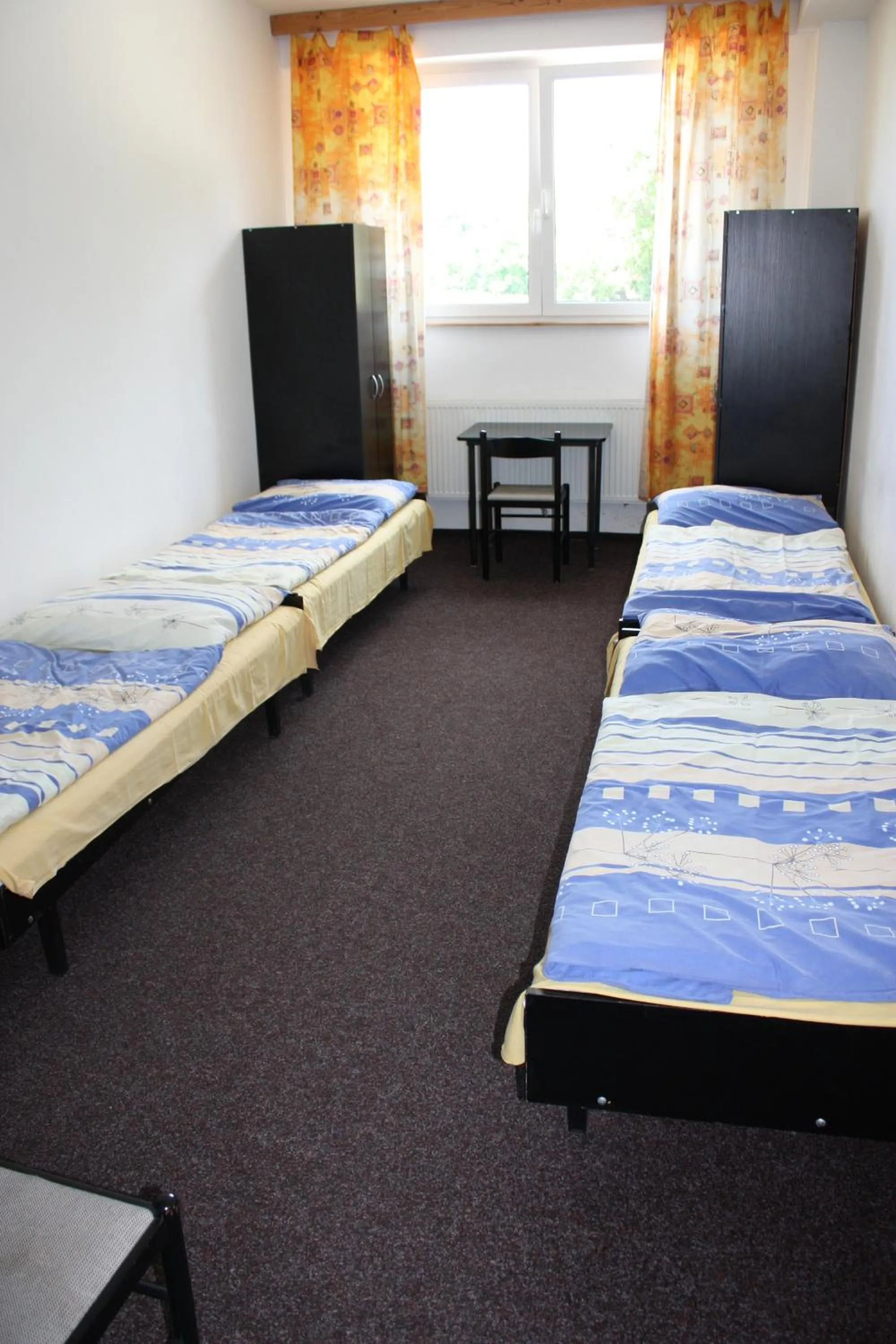 Photo of the whole room, Bed in Sporthotel BK Pod Lipou