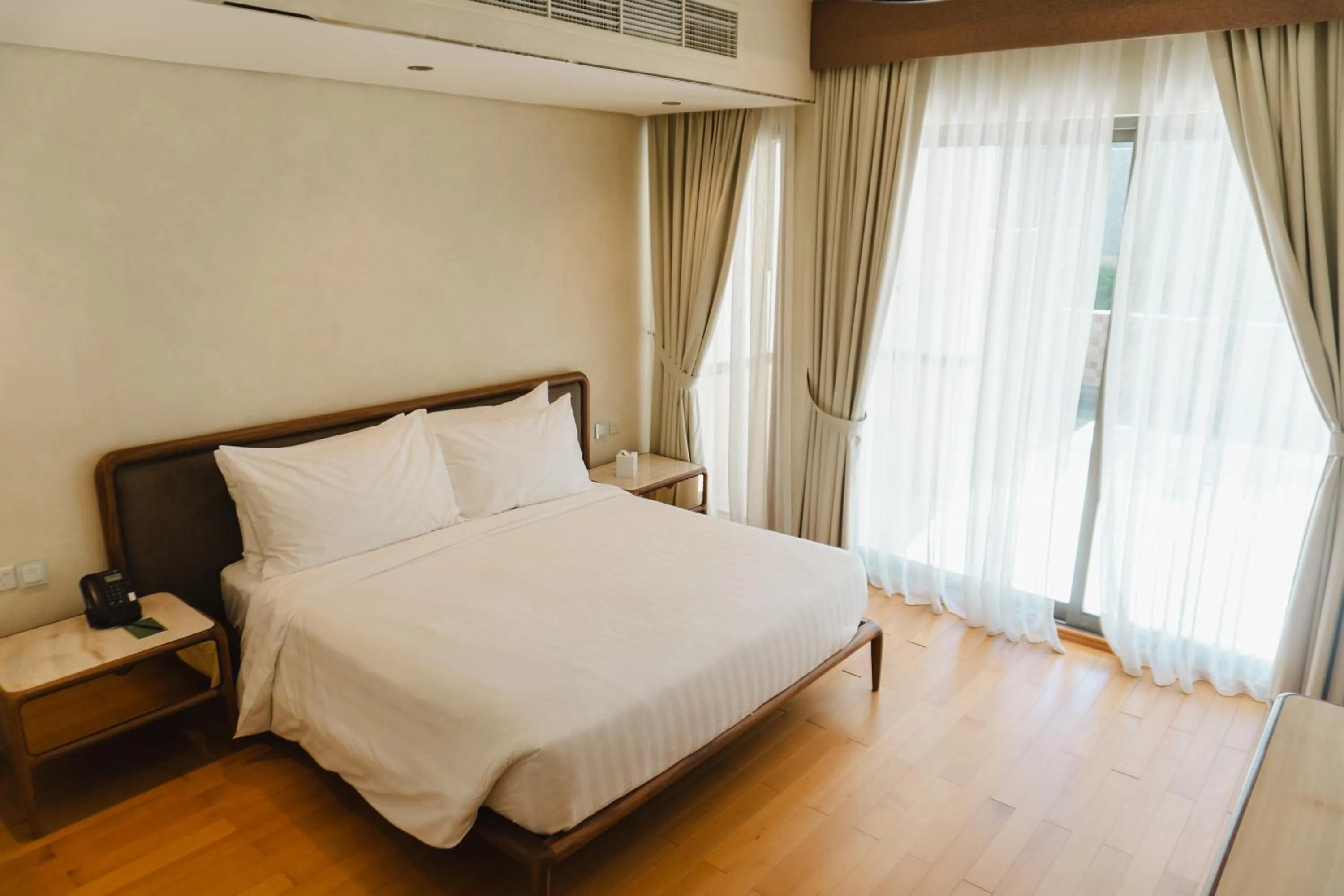 Bed in Palavra Resort
