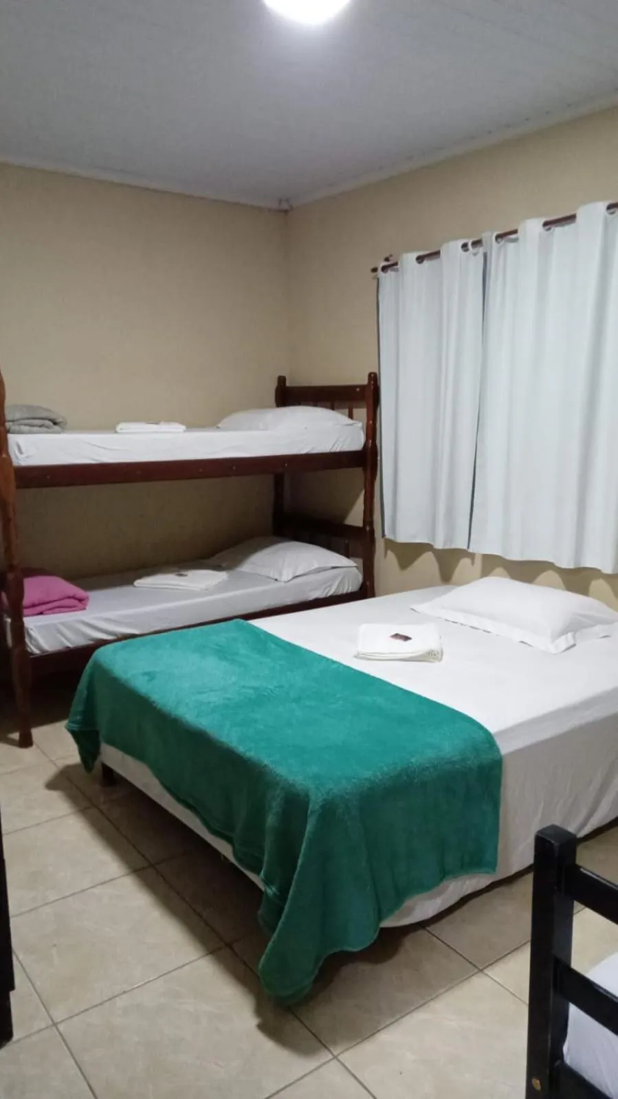 Property building, Bed in Pousada Village Rio Centro