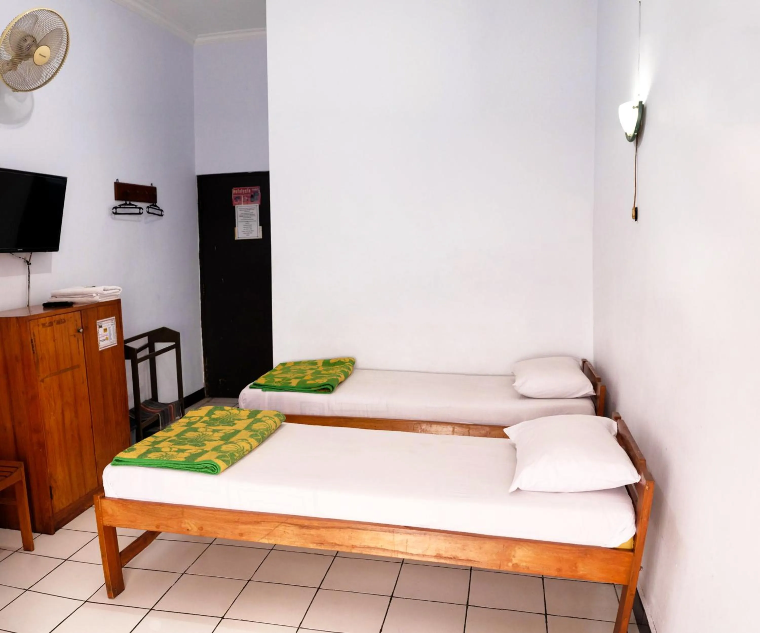 Bedroom, Bed in Hotel Wisata