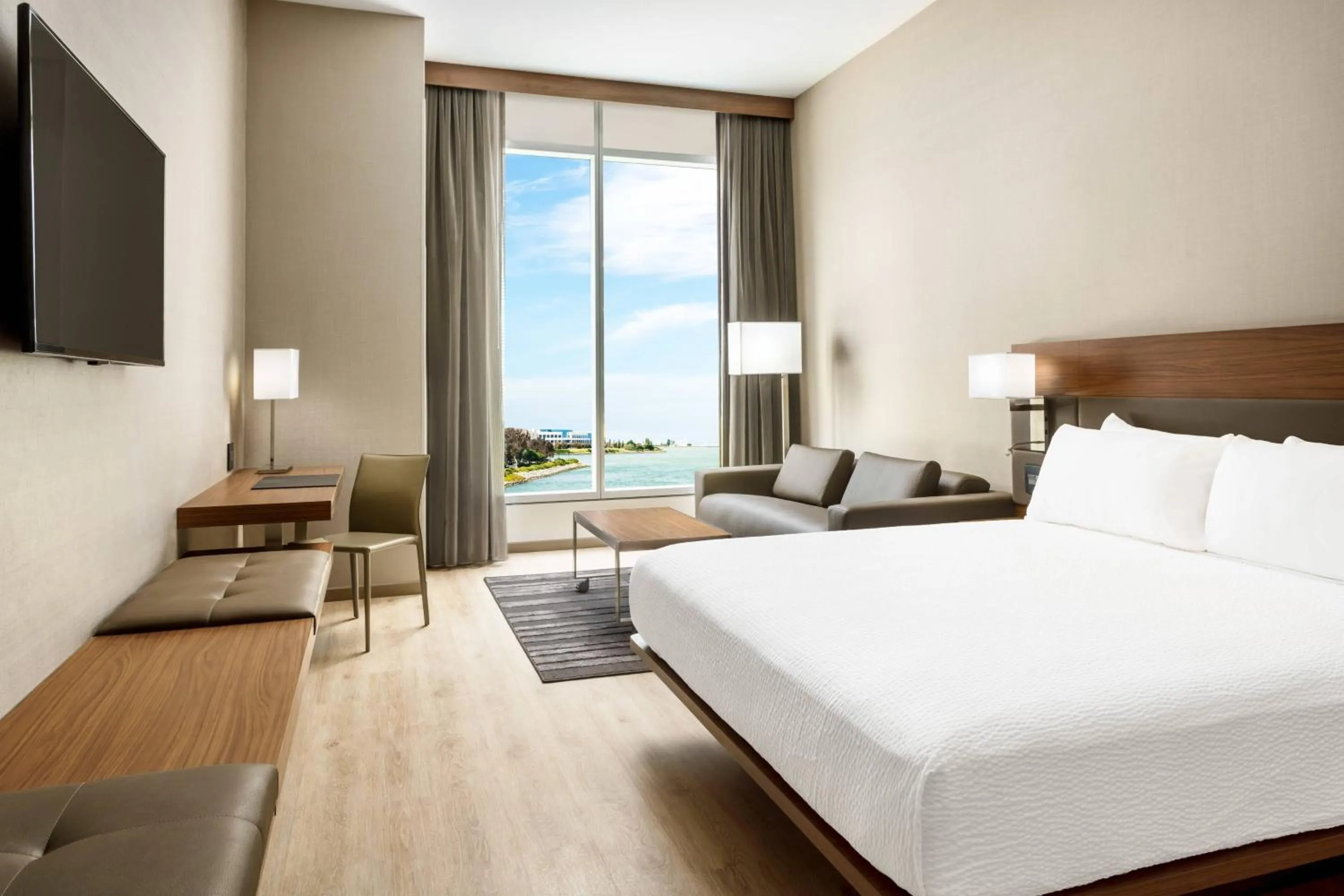 Photo of the whole room, Bed in AC Hotel by Marriott San Francisco Airport/Oyster Point Waterfront