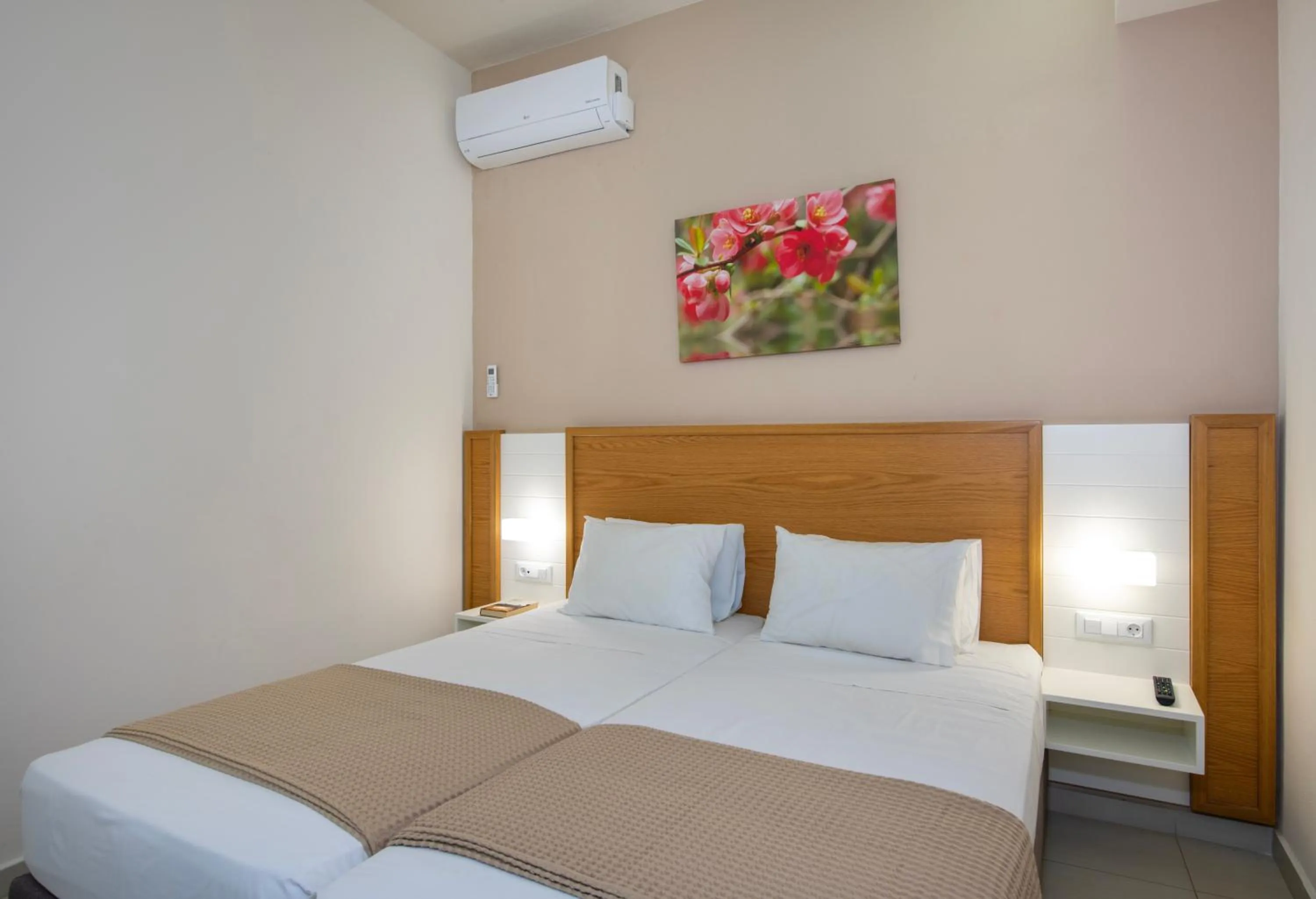 Bed in Atrion Resort Hotel