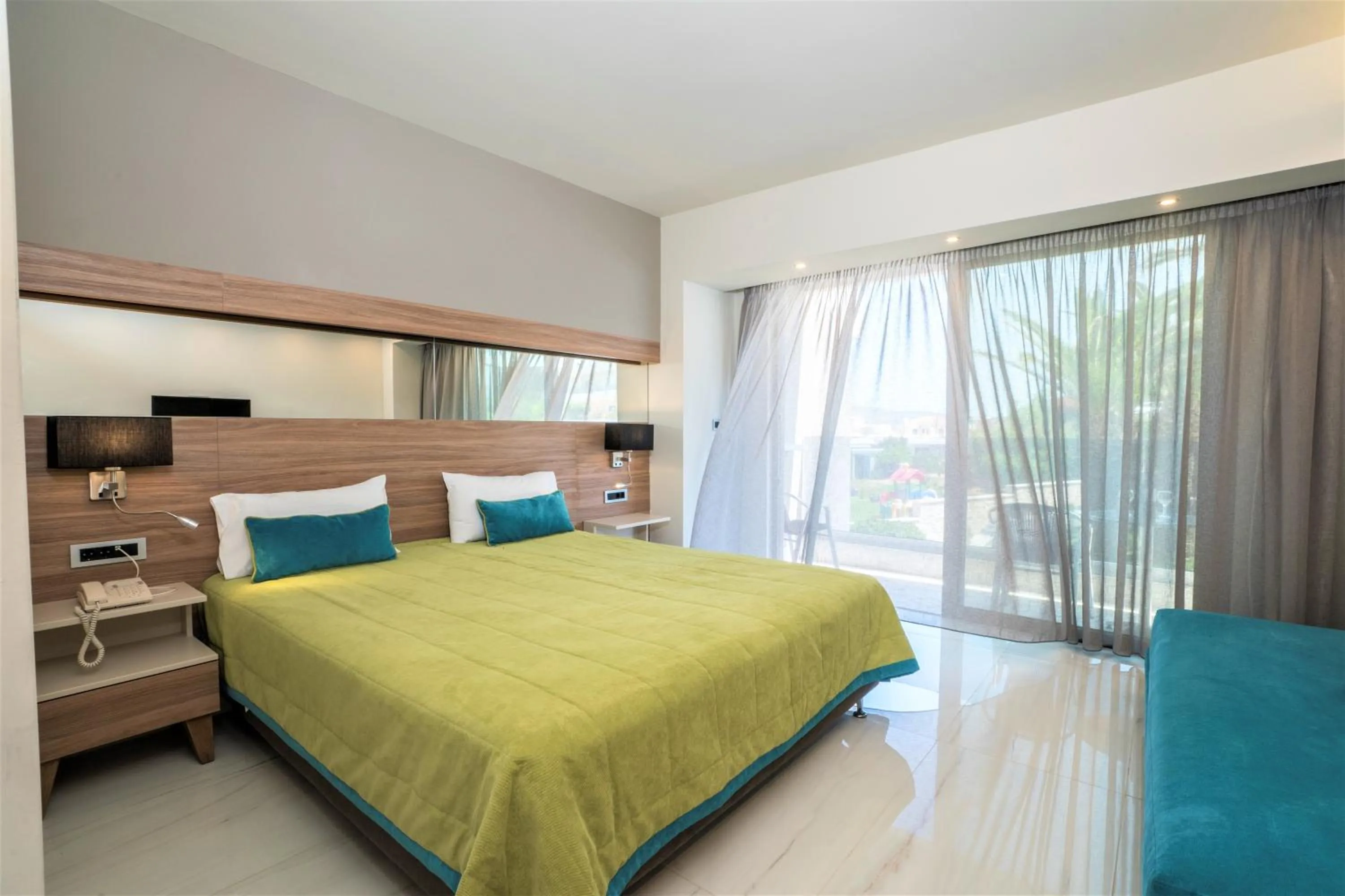 Bed in Atrion Resort Hotel