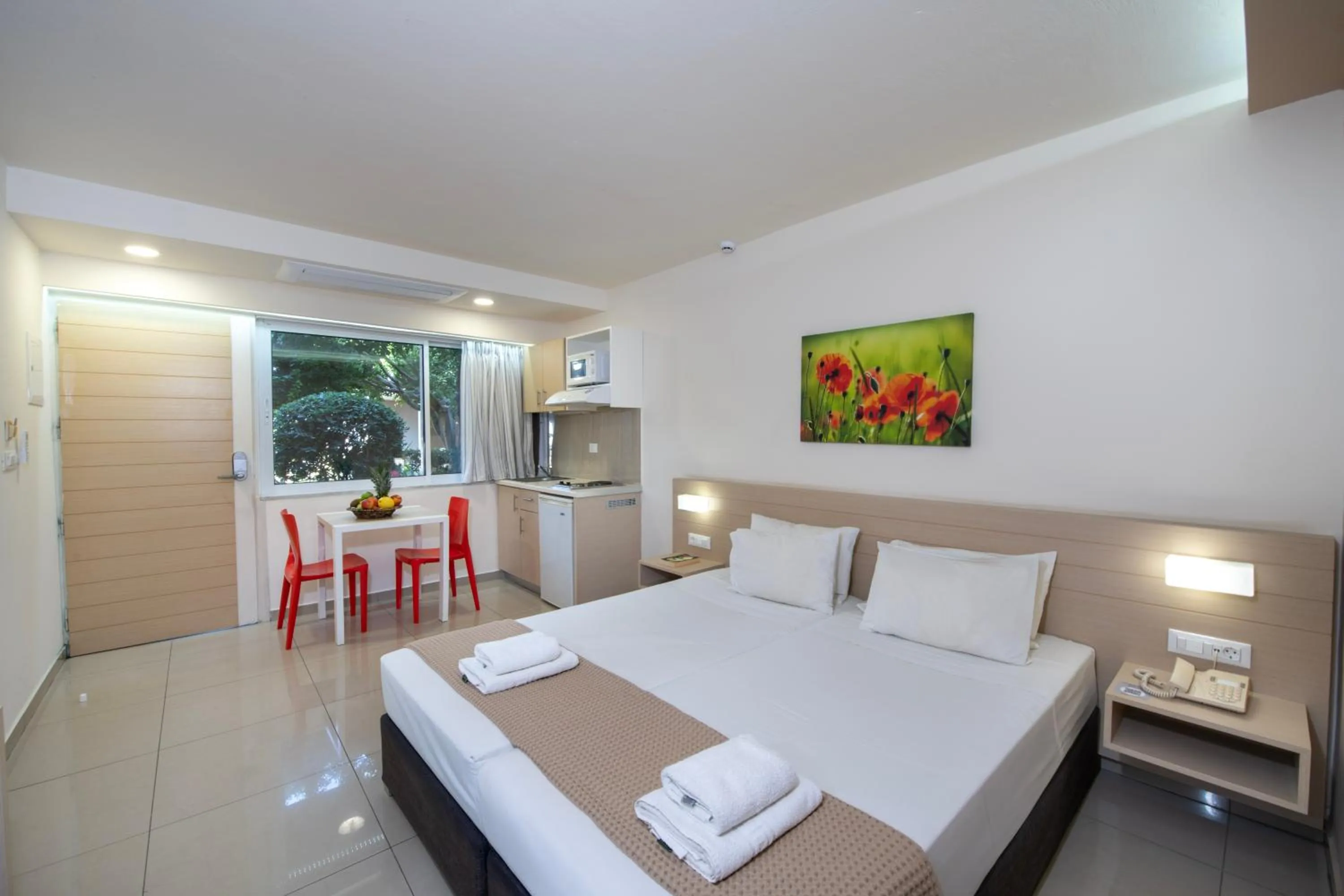 Bed in Atrion Resort Hotel