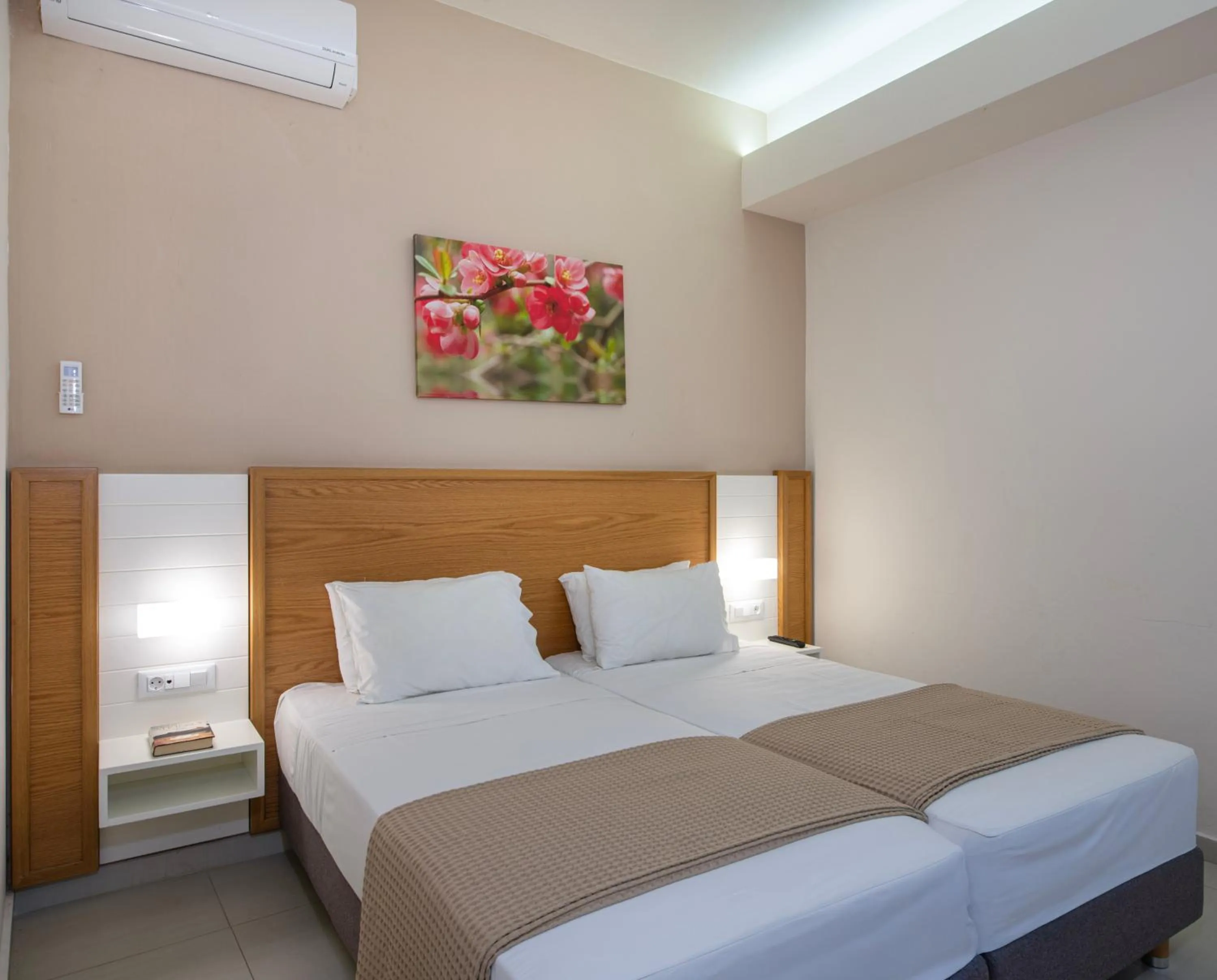 Bed in Atrion Resort Hotel