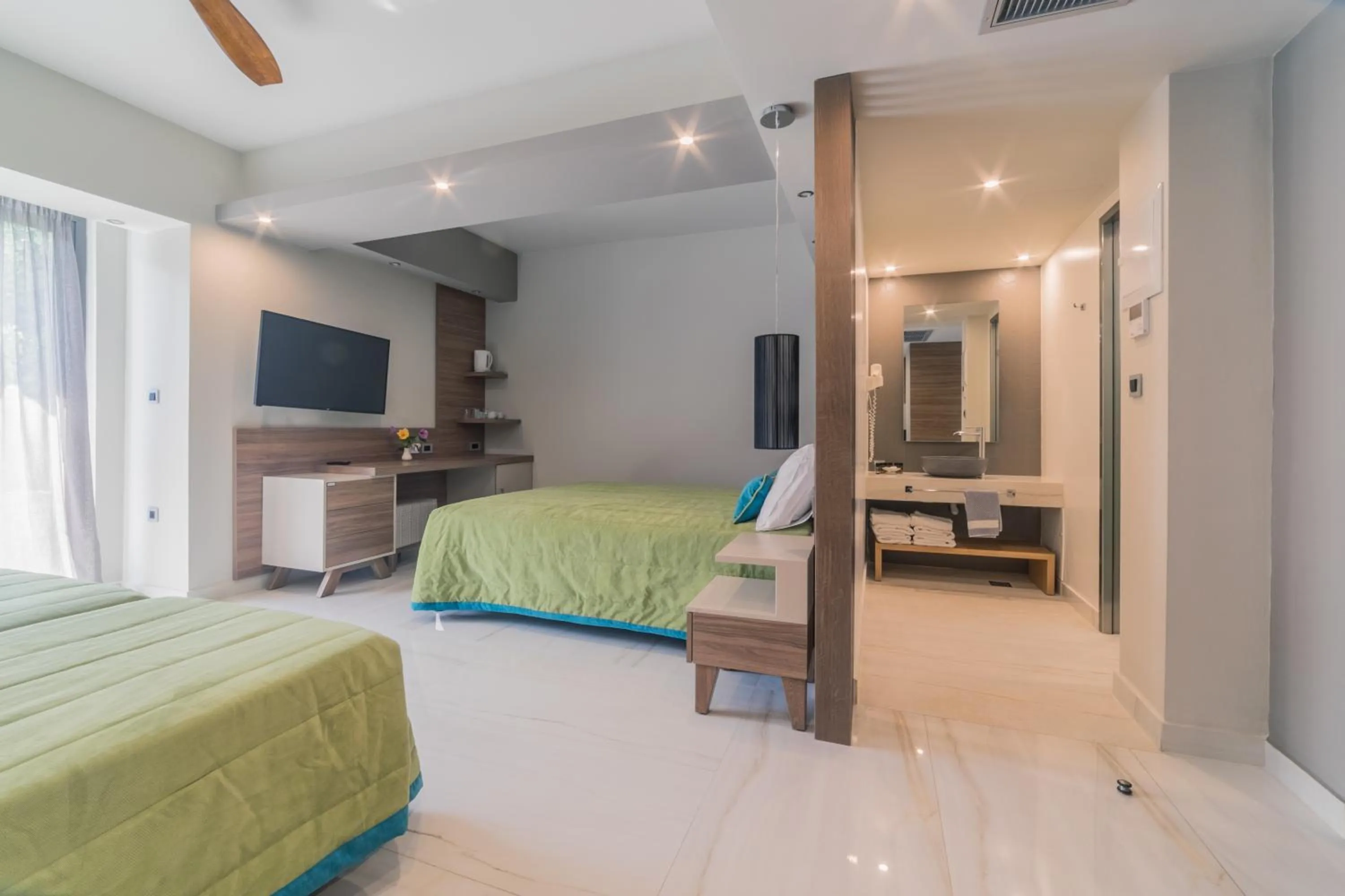 Bed in Atrion Resort Hotel