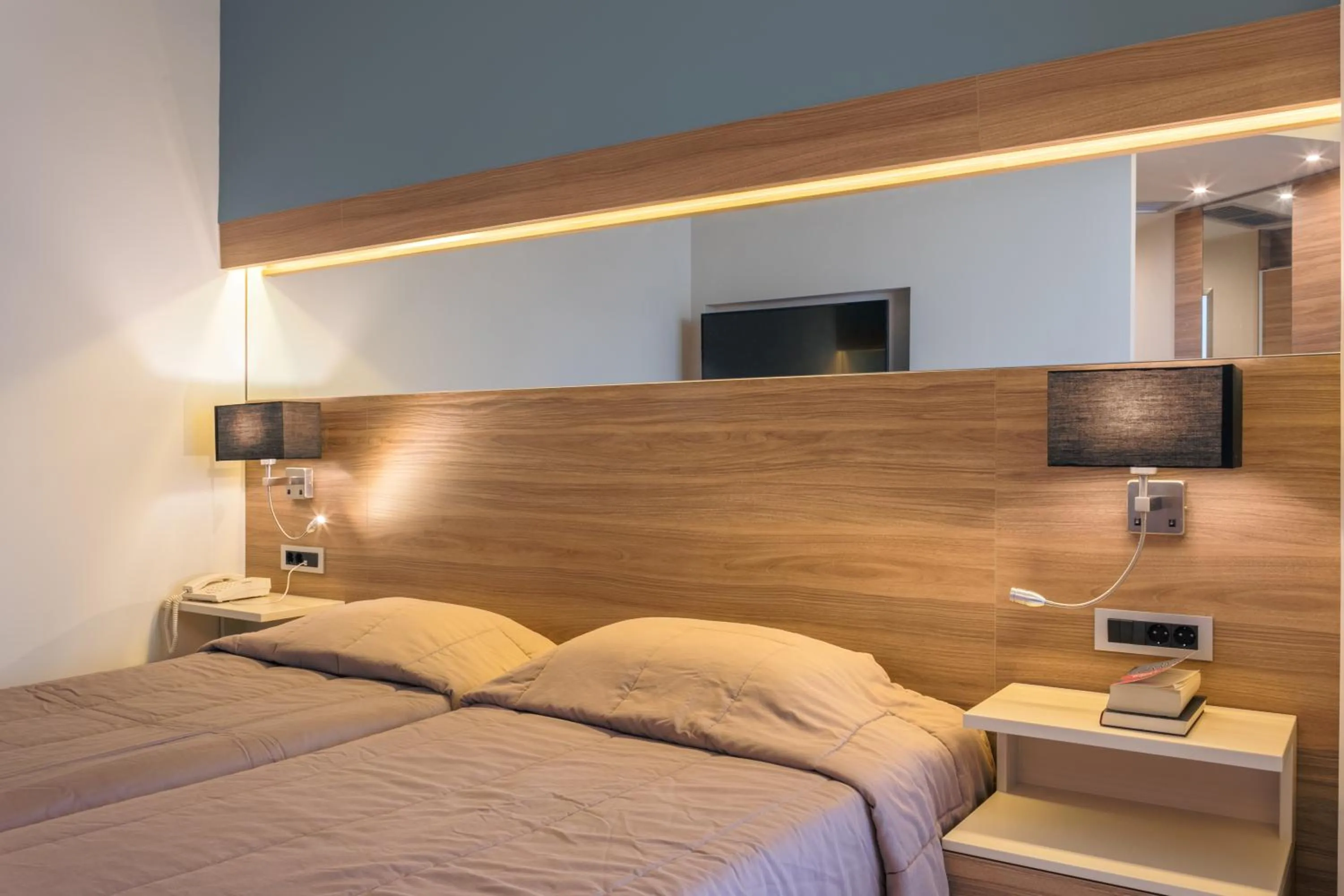 Bed in Atrion Resort Hotel