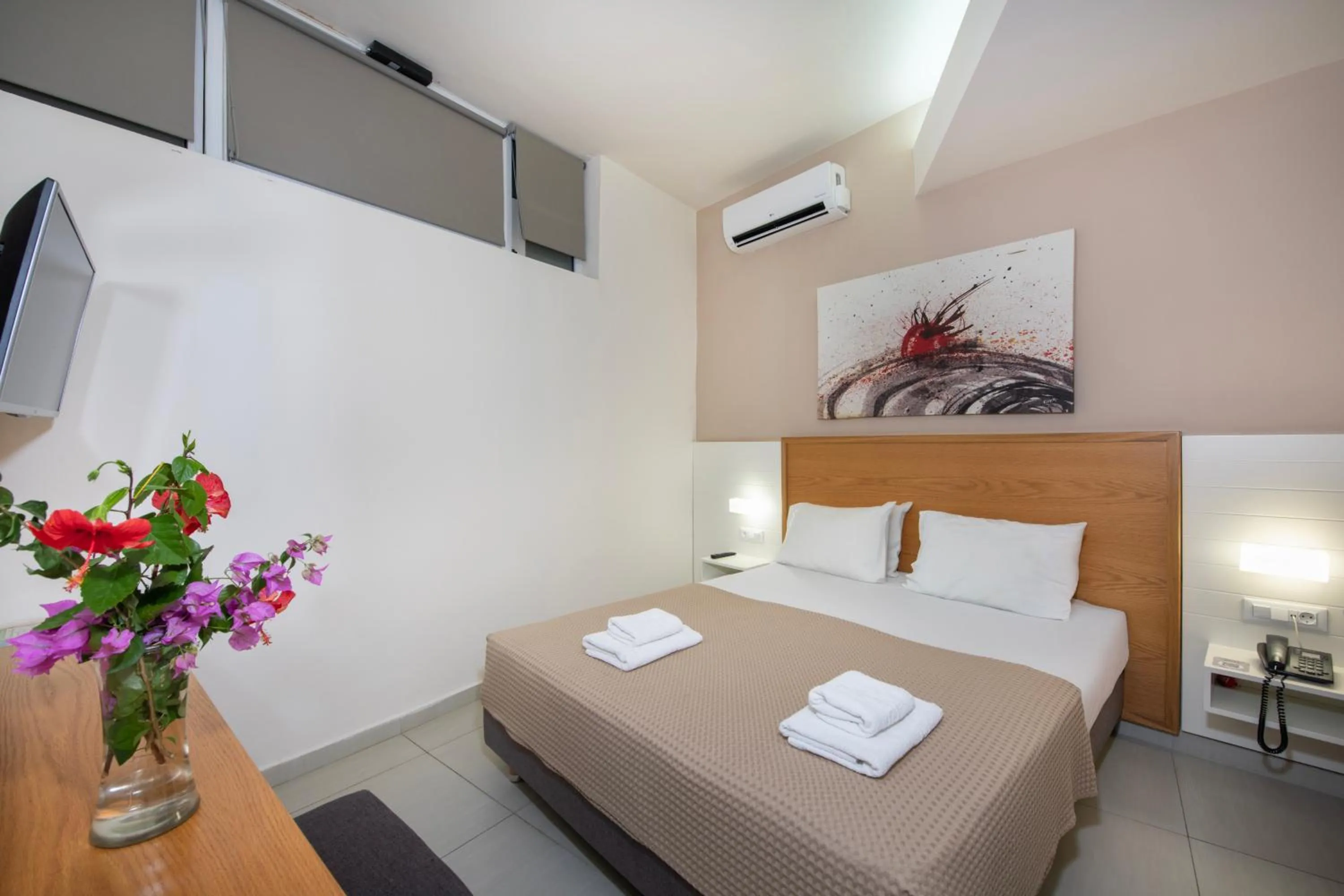 Bed in Atrion Resort Hotel