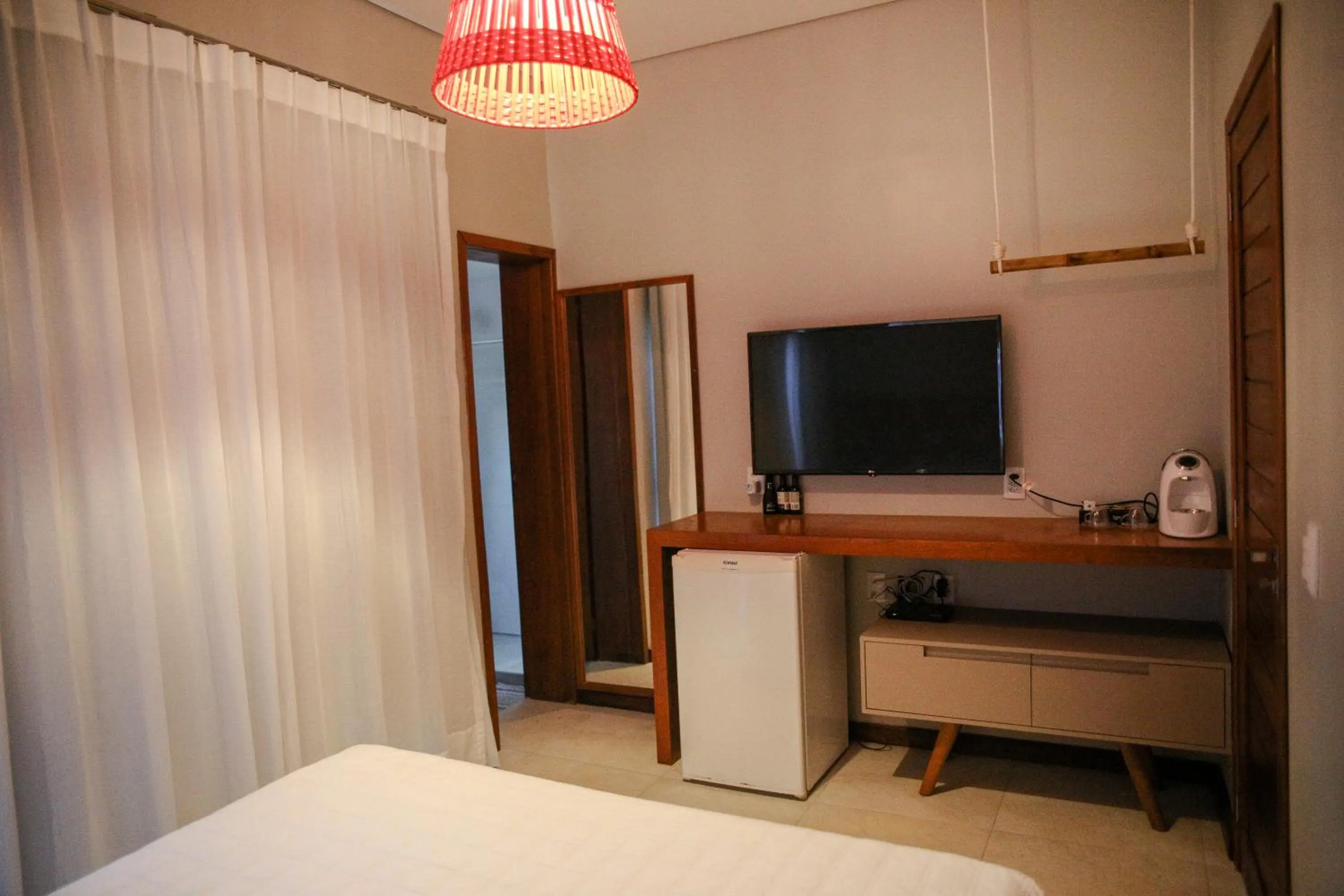 Property building, Bed in Pousada Nascer do Sol