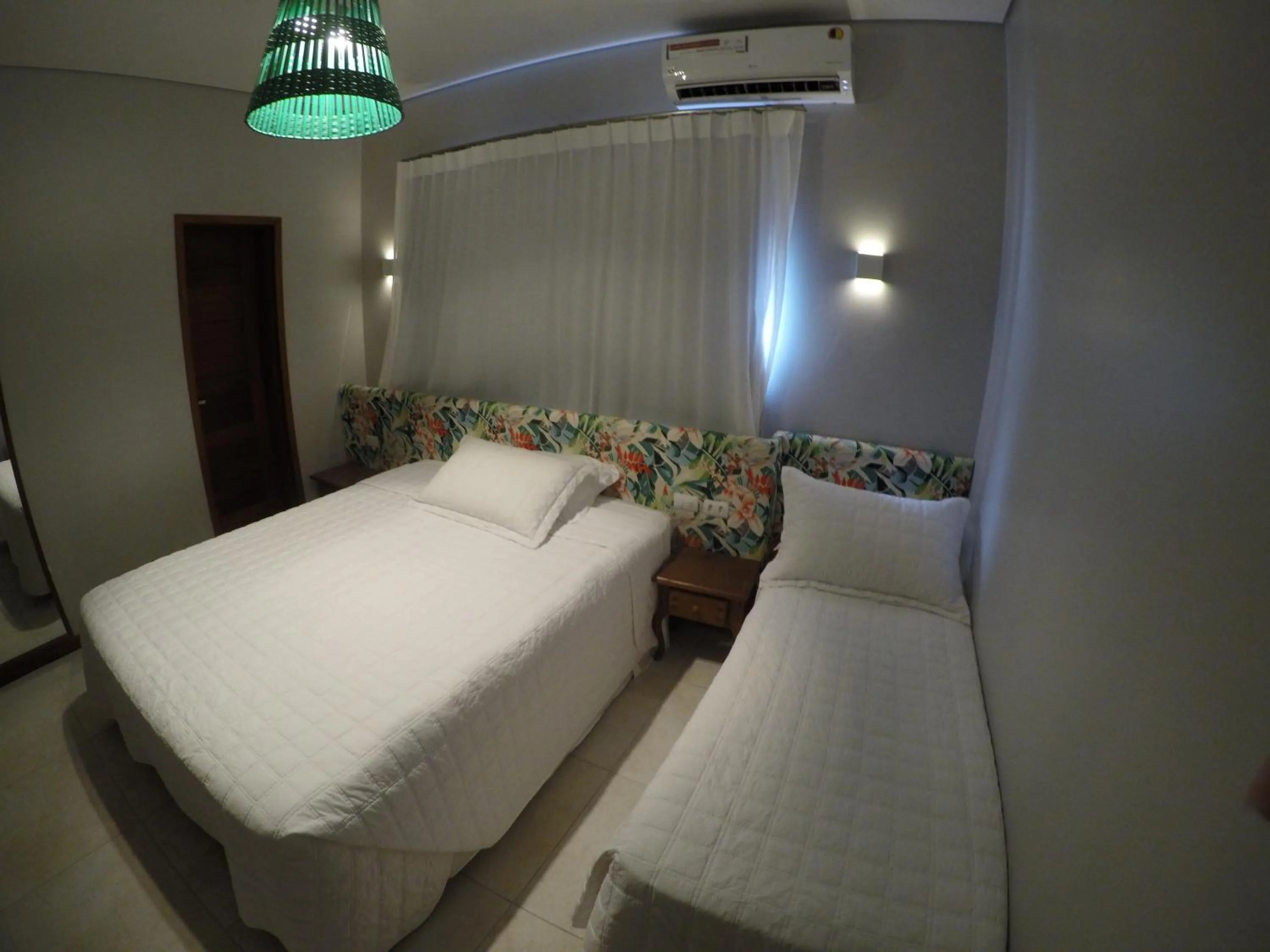 Bed in Pousada Nascer do Sol