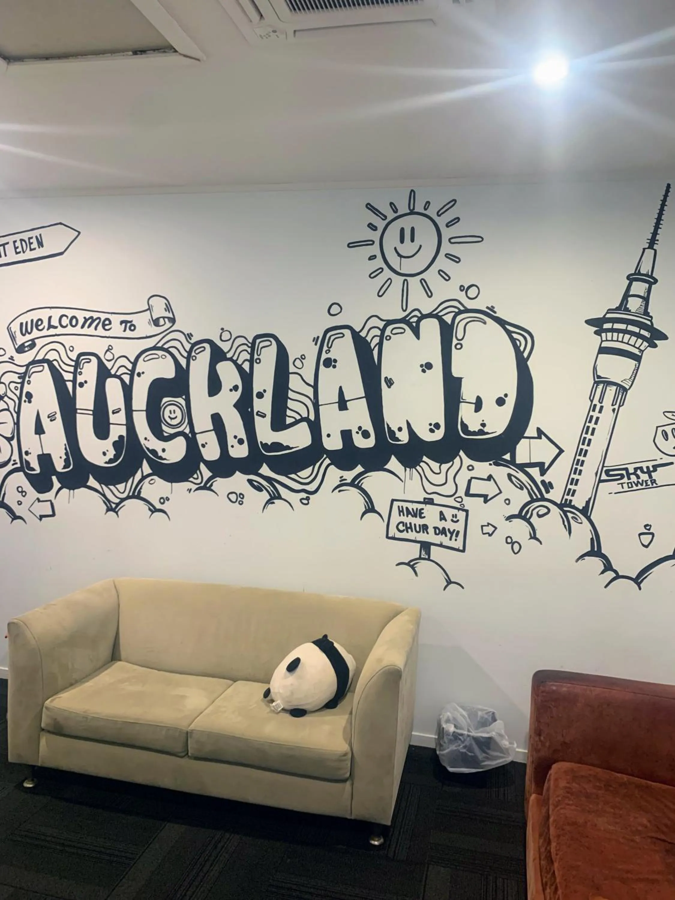 Communal lounge/ TV room in Metro Adventurer Backpackers