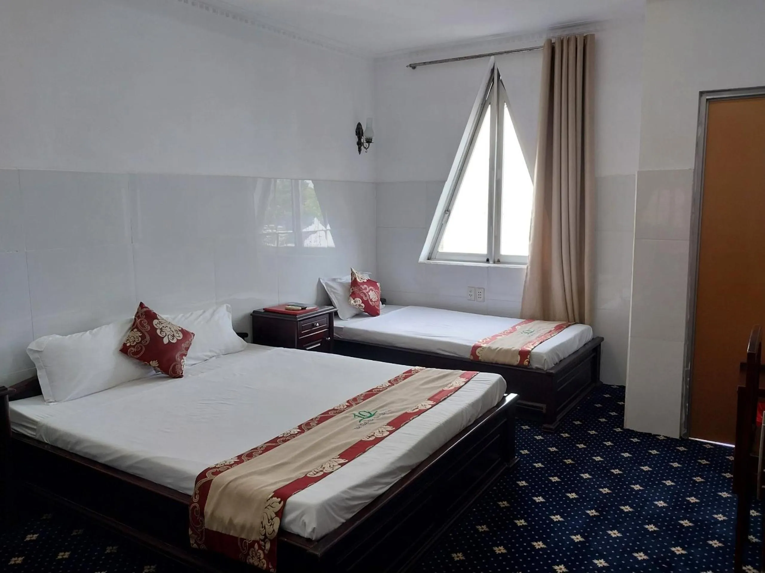 Bed in Nhat Quy Hotel